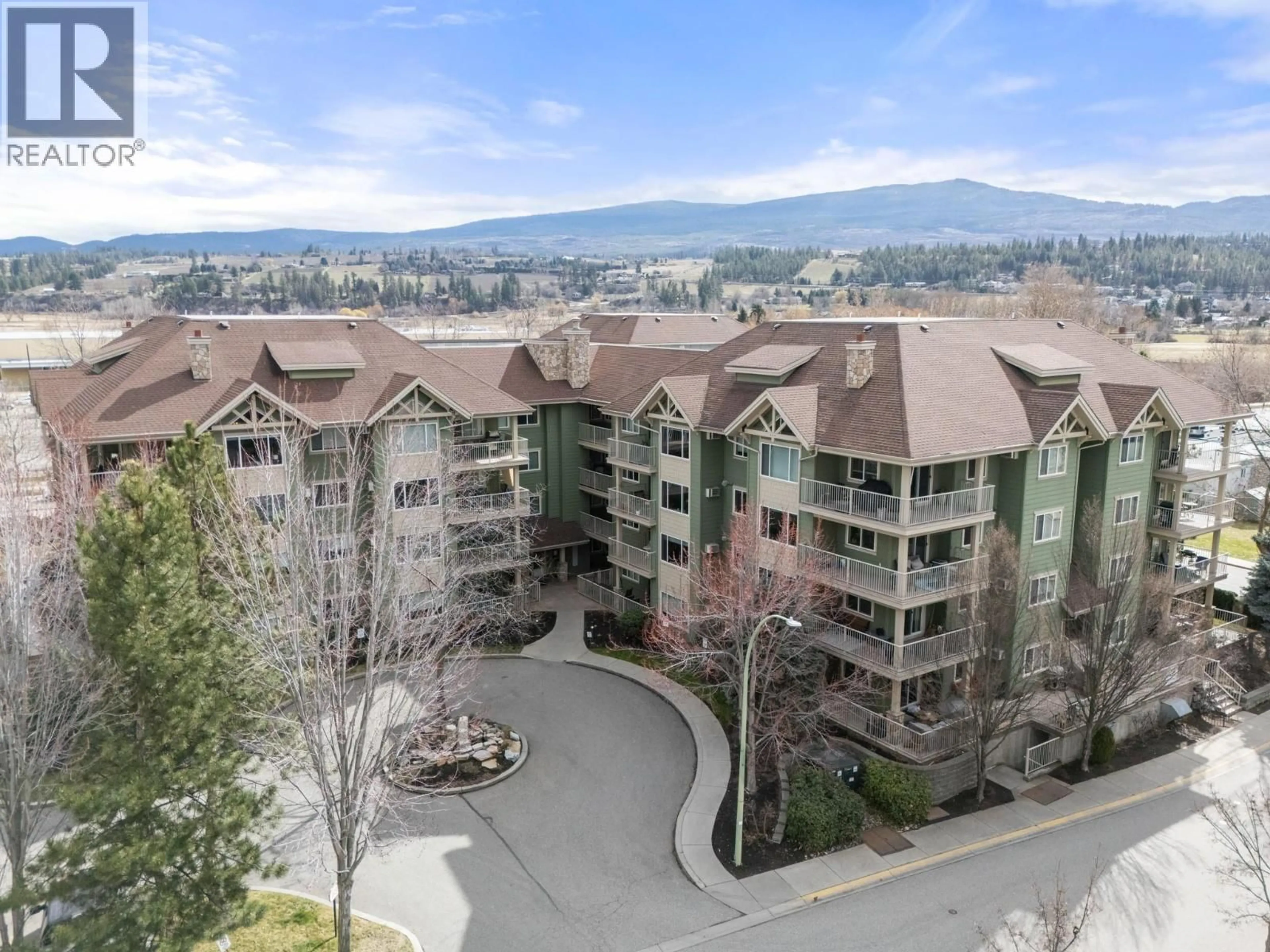 A pic from outside/outdoor area/front of a property/back of a property/a pic from drone, mountain view for 204 - 686 LEQUIME ROAD, Kelowna British Columbia V1W1A4