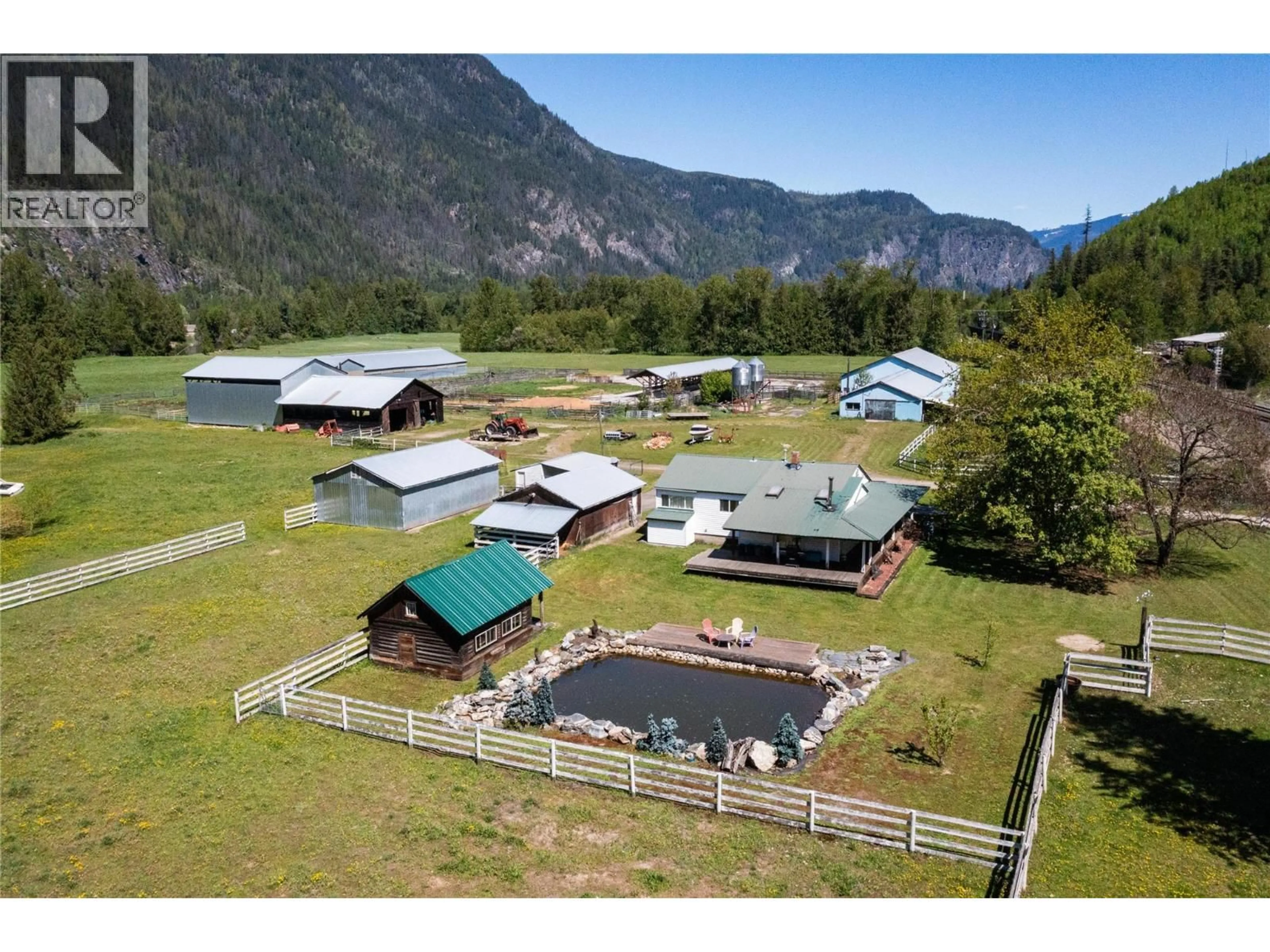 A pic from outside/outdoor area/front of a property/back of a property/a pic from drone, mountain view for 2169 SOLSQUA ROAD, Sicamous British Columbia V0E2V0