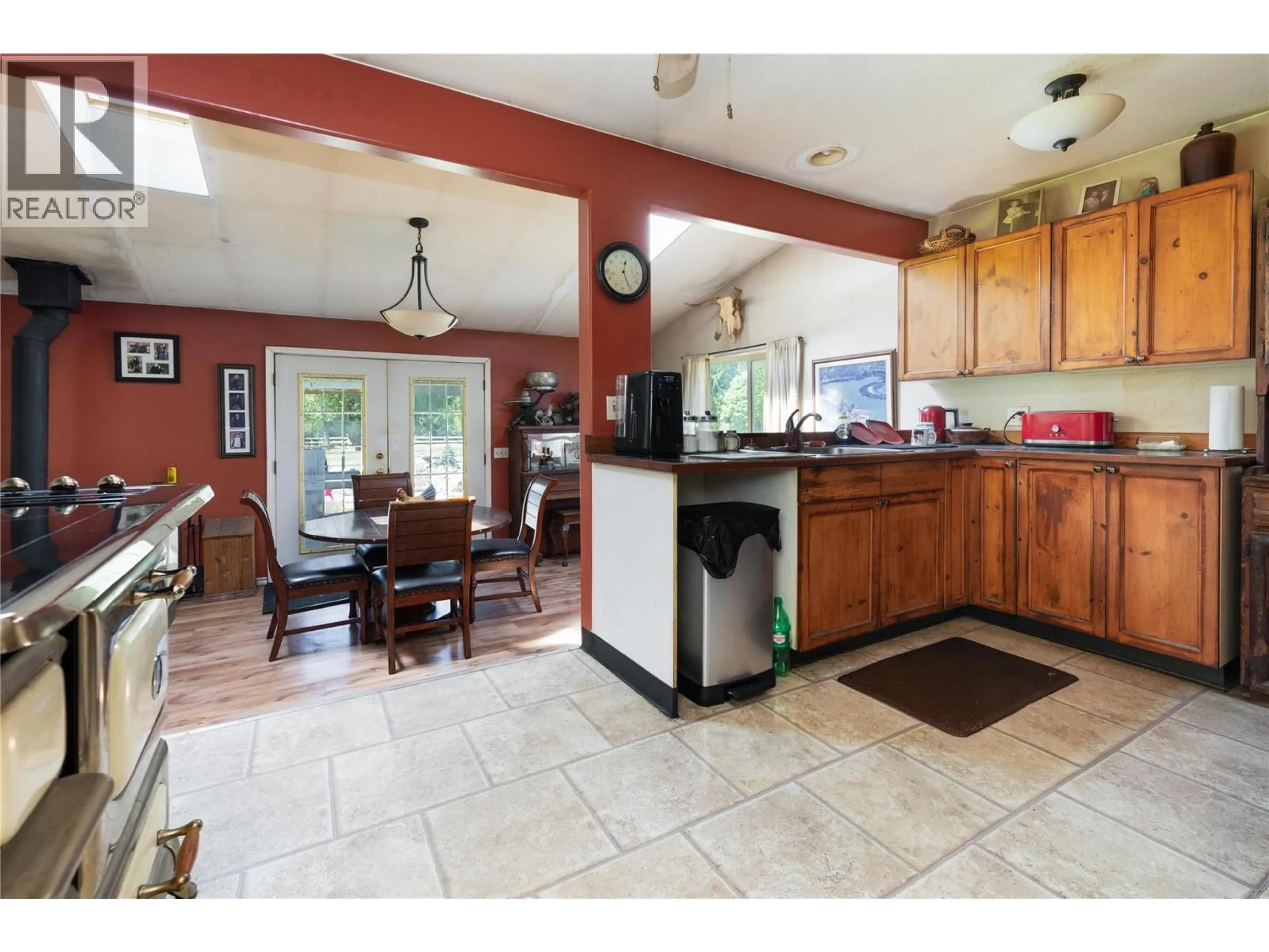 Open concept kitchen, ceramic/tile floor for 2169 SOLSQUA ROAD, Sicamous British Columbia V0E2V0