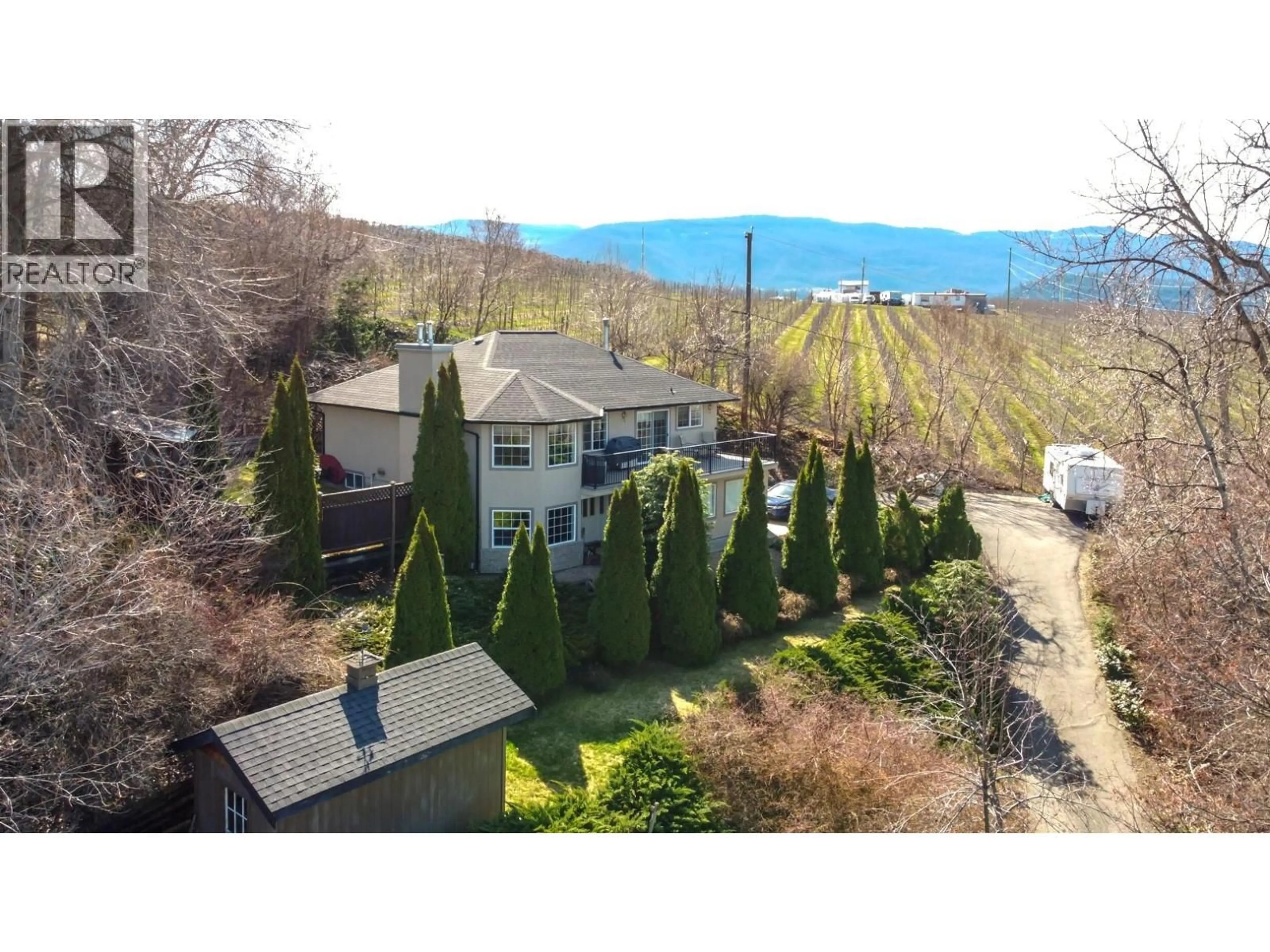 A pic from outside/outdoor area/front of a property/back of a property/a pic from drone, mountain view for 595 GROUSE ROAD, Vernon British Columbia V1B3B1