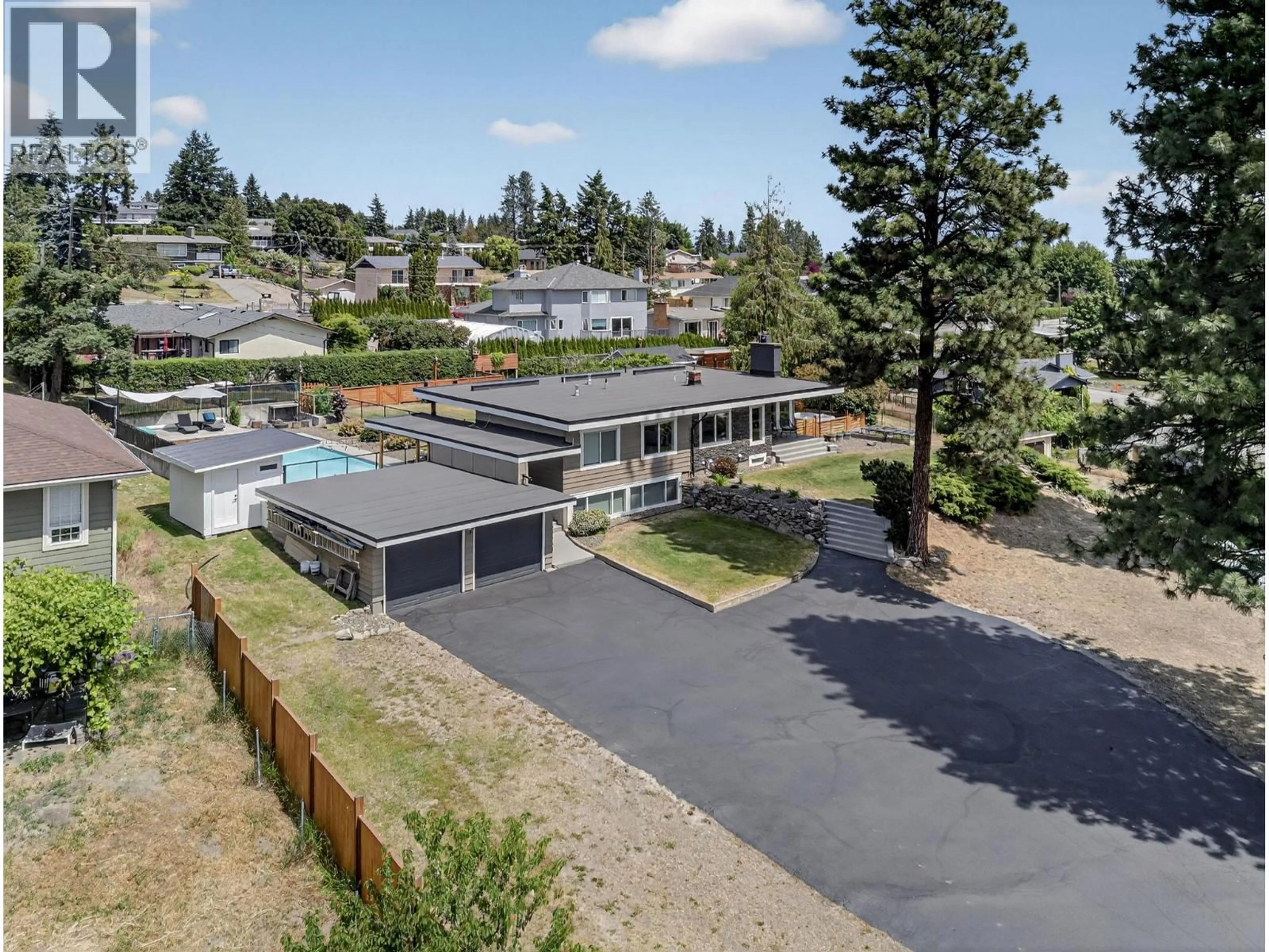A pic from outside/outdoor area/front of a property/back of a property/a pic from drone, mountain view for 2715 BOUCHERIE ROAD, West Kelowna British Columbia V1Z2G3