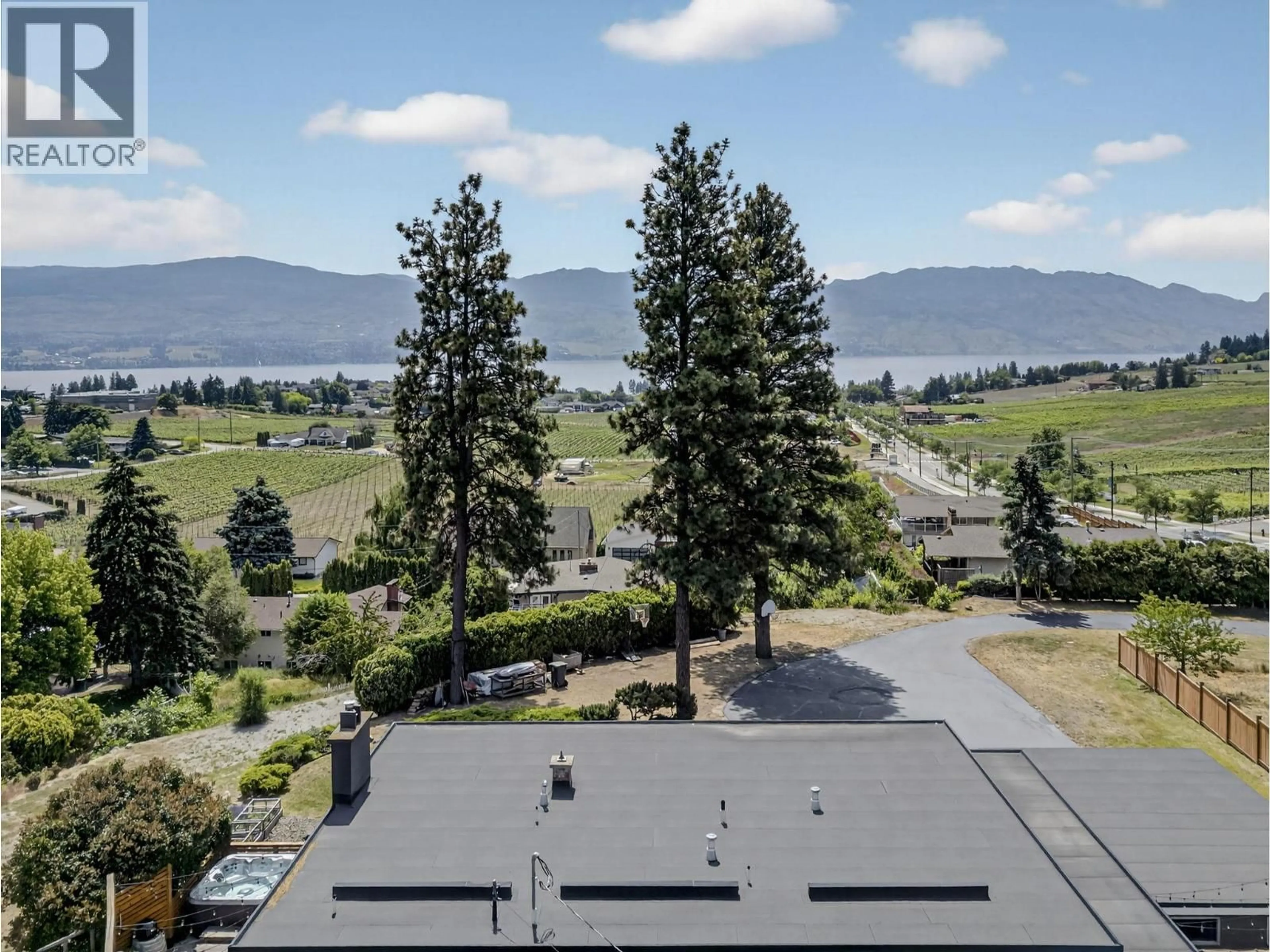 A pic from outside/outdoor area/front of a property/back of a property/a pic from drone, water/lake/river/ocean view for 2715 BOUCHERIE ROAD, West Kelowna British Columbia V1Z2G3