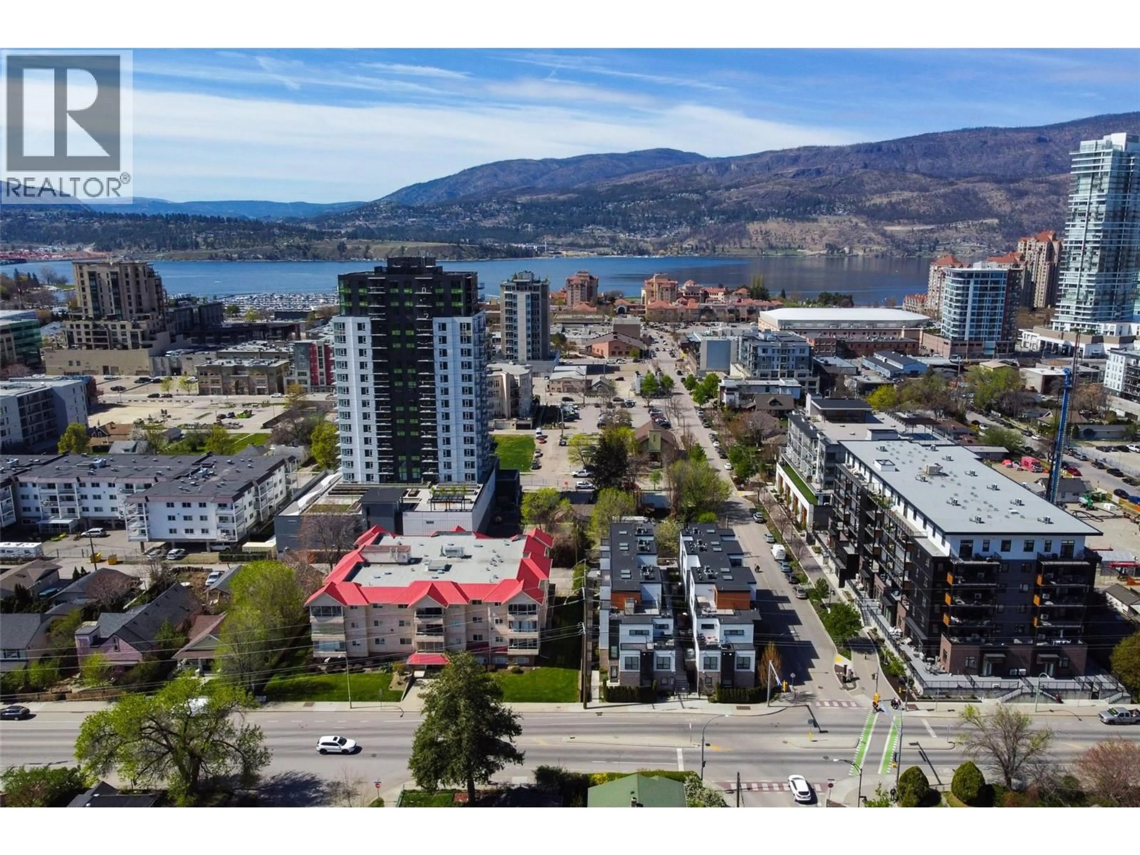 A pic from outside/outdoor area/front of a property/back of a property/a pic from drone, unknown for 104 - 1308 RICHTER STREET, Kelowna British Columbia V1Y2L3