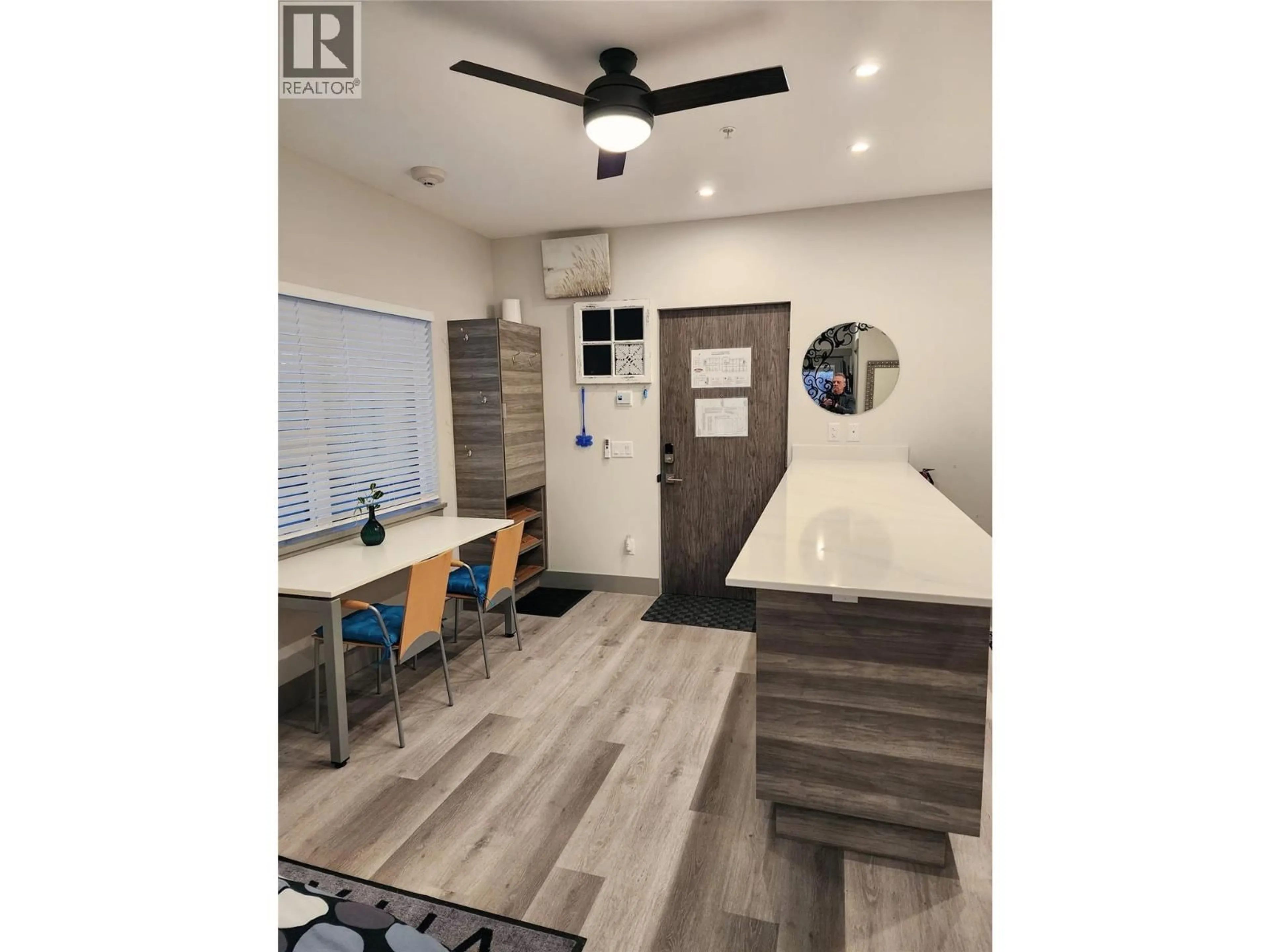 Open concept kitchen, wood/laminate floor for 316 - 2555 LAKESHORE ROAD, Vernon British Columbia V1H0A4