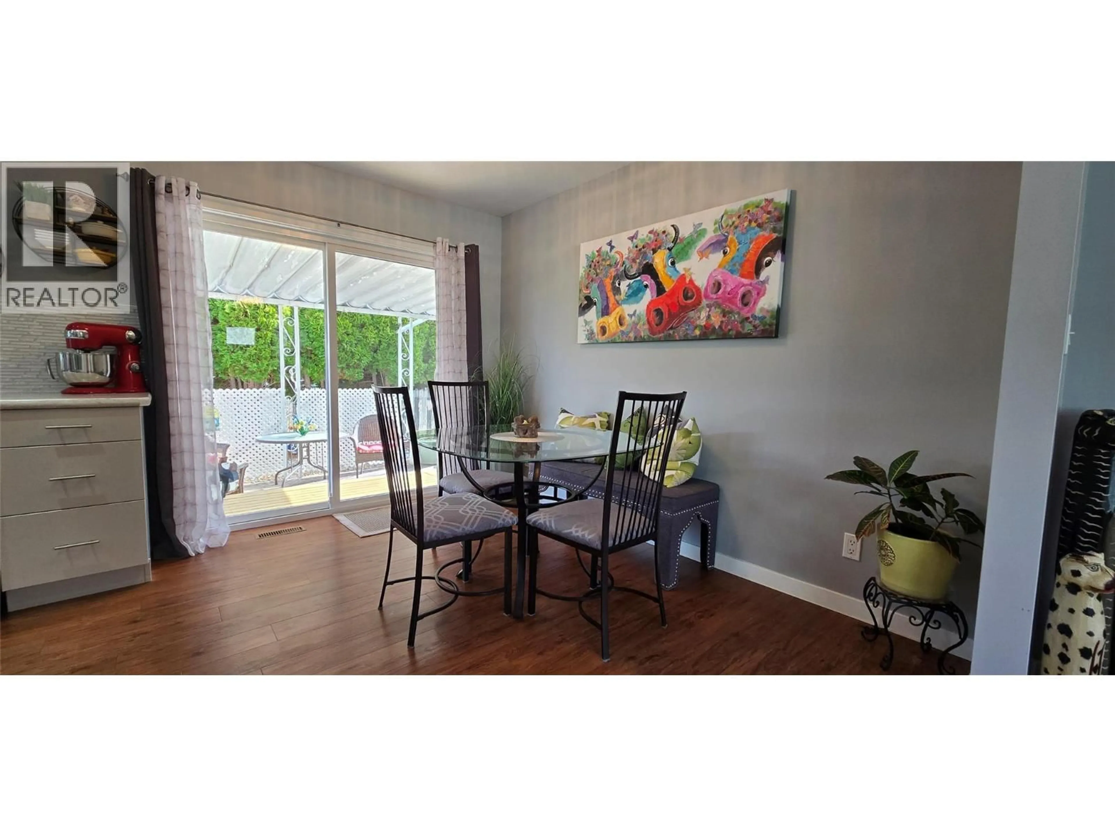 Dining room, wood/laminate floor for 9 SANTA ROSA PLACE, Osoyoos British Columbia V0H1V2