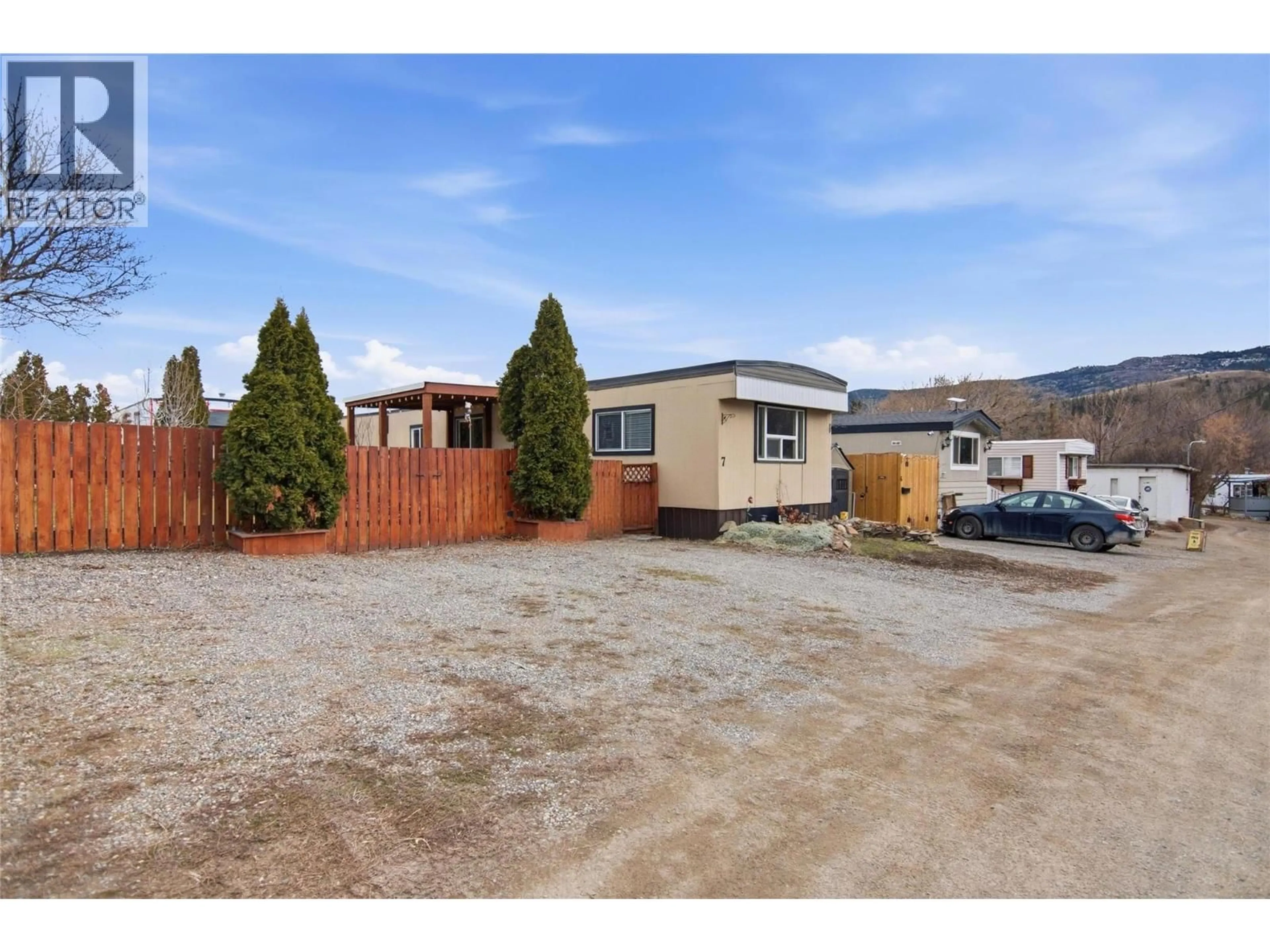 A pic from outside/outdoor area/front of a property/back of a property/a pic from drone, mountain view for 7 - 4796 TRANS CANADA  W HIGHWAY, Kamloops British Columbia V1S2A8