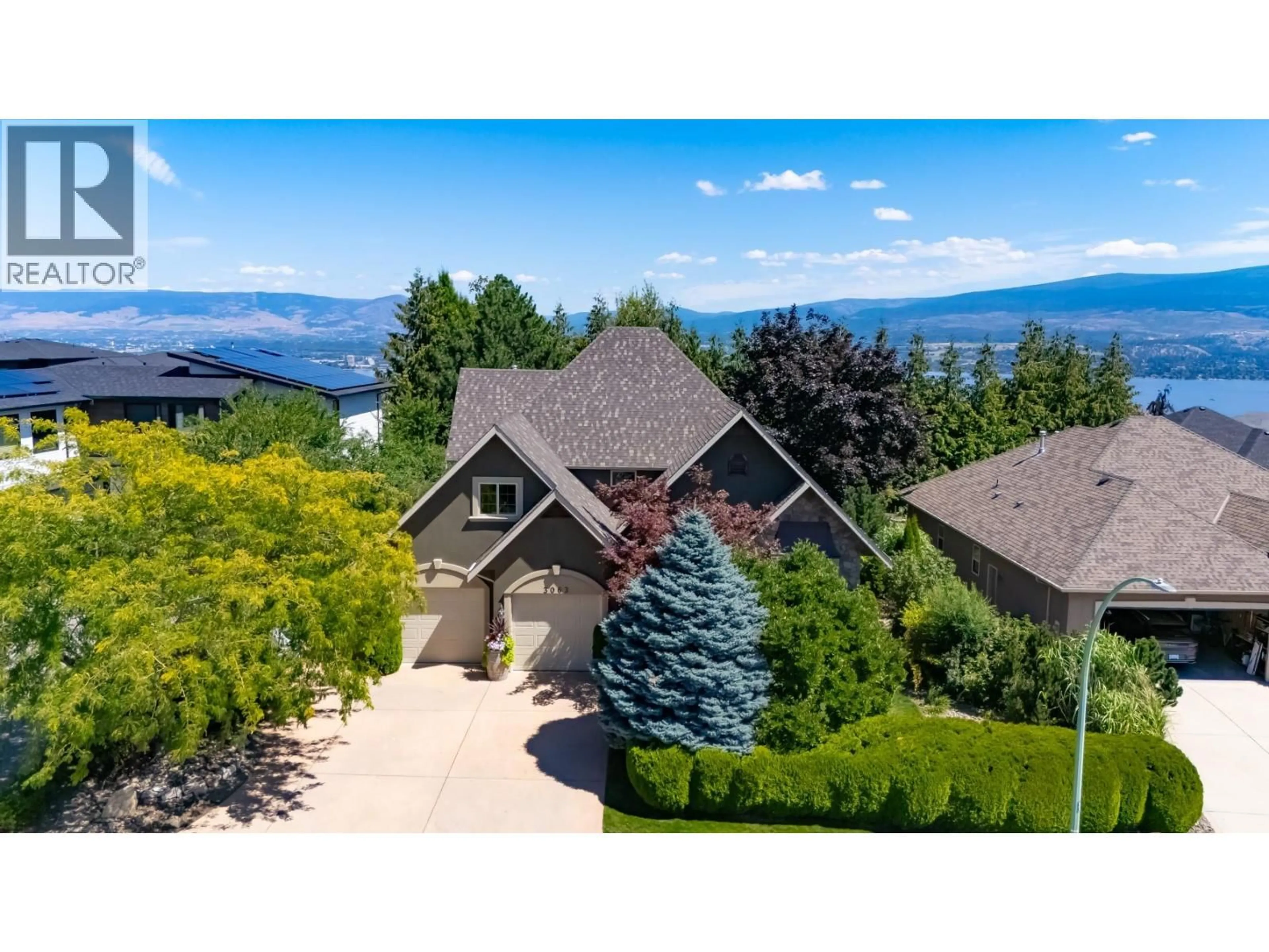 A pic from outside/outdoor area/front of a property/back of a property/a pic from drone, mountain view for 3063 THACKER DRIVE, West Kelowna British Columbia V1Z1X5