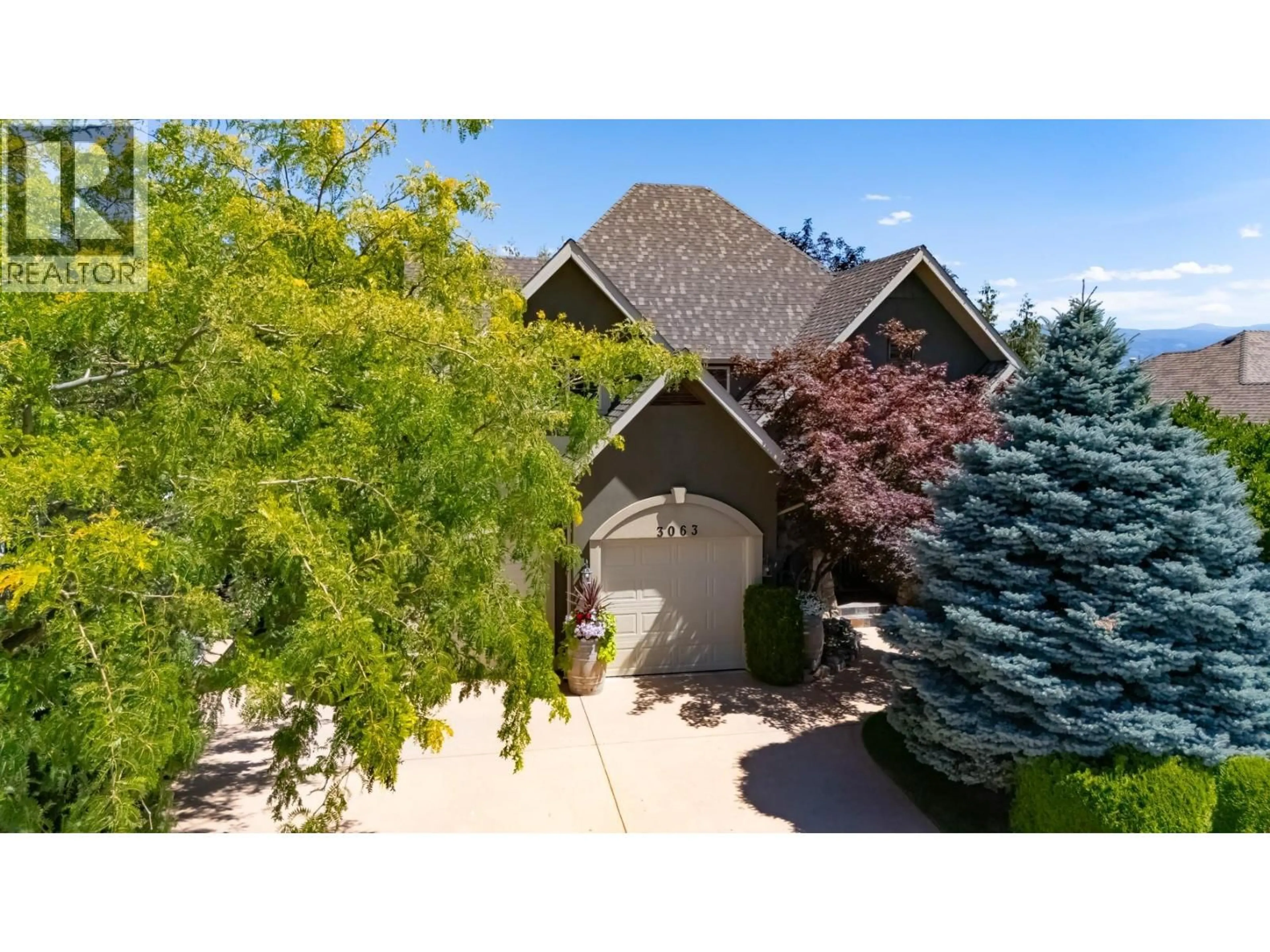 A pic from outside/outdoor area/front of a property/back of a property/a pic from drone, street for 3063 THACKER DRIVE, West Kelowna British Columbia V1Z1X5