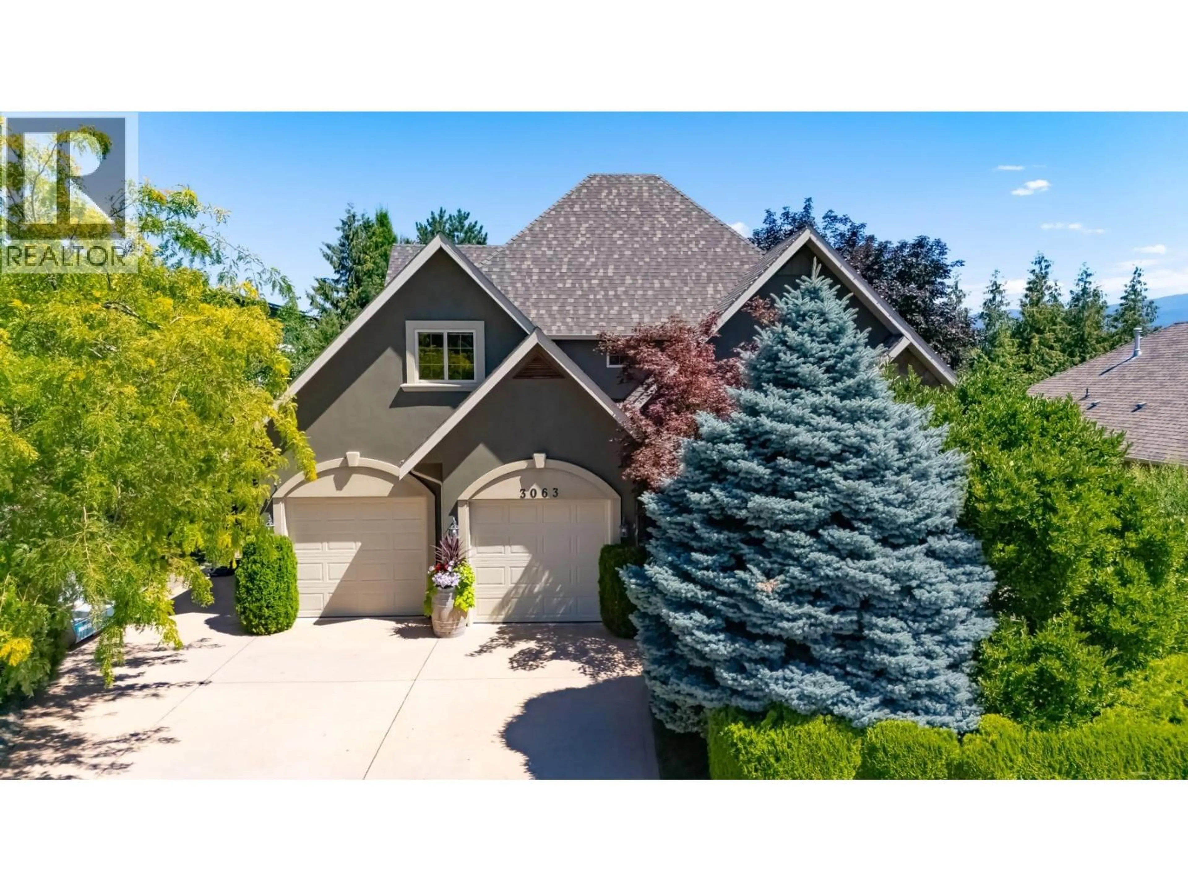 A pic from outside/outdoor area/front of a property/back of a property/a pic from drone, street for 3063 THACKER DRIVE, West Kelowna British Columbia V1Z1X5