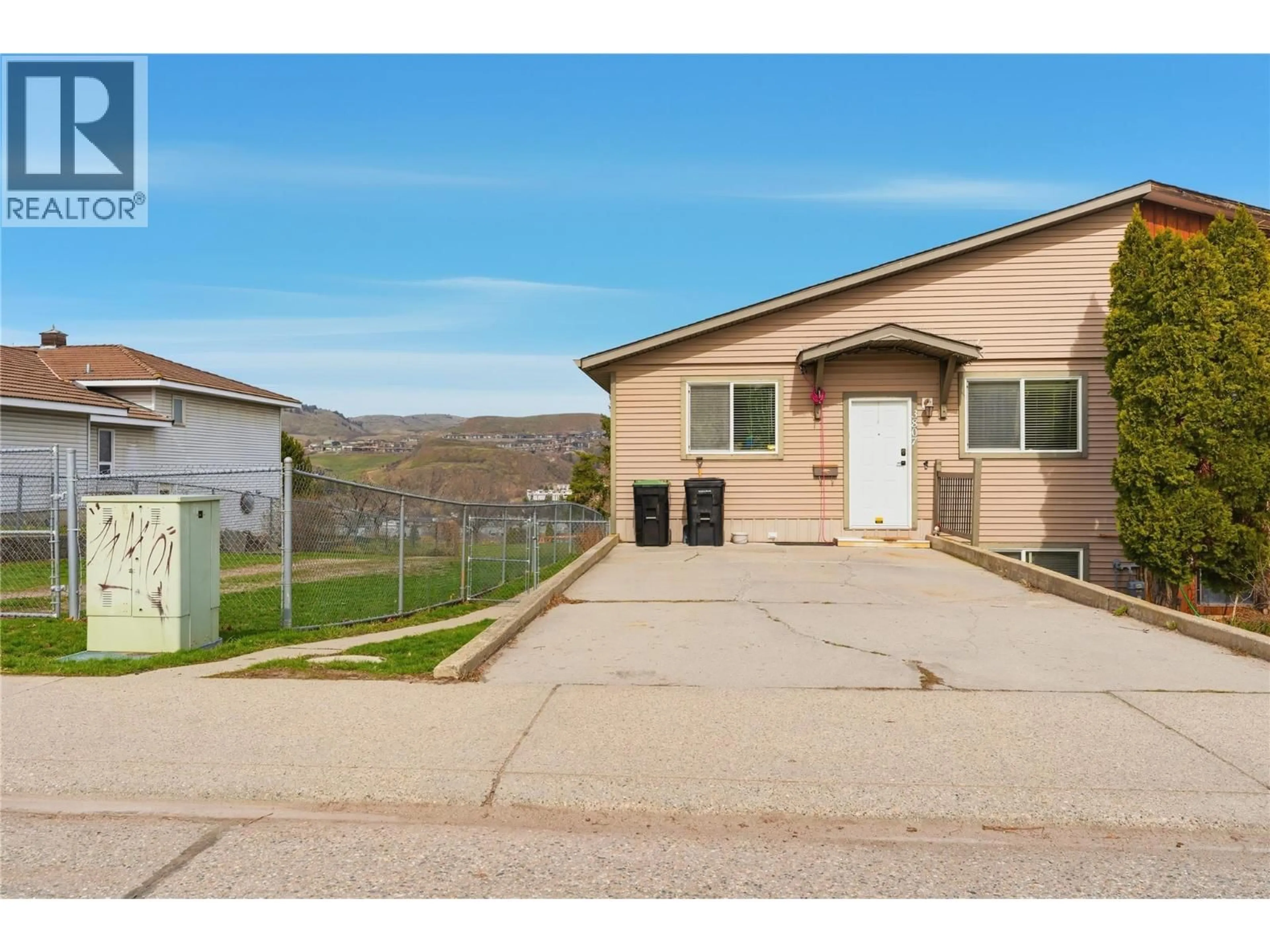 Home with vinyl exterior material, street for 3807 15 AVENUE, Vernon British Columbia V1T7Z8