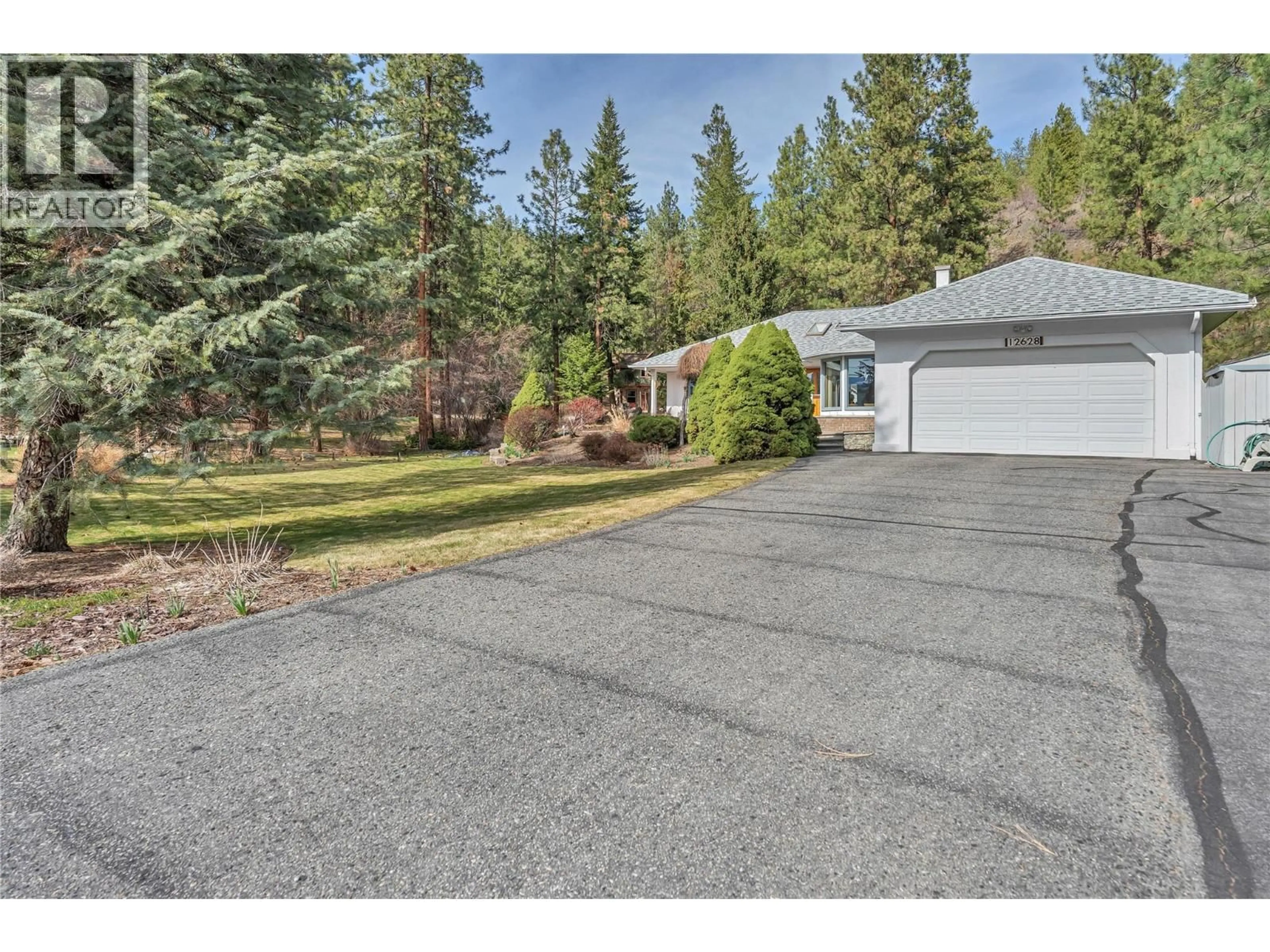 A pic from outside/outdoor area/front of a property/back of a property/a pic from drone, street for 12628 MORROW AVENUE, Summerland British Columbia V0H1Z8