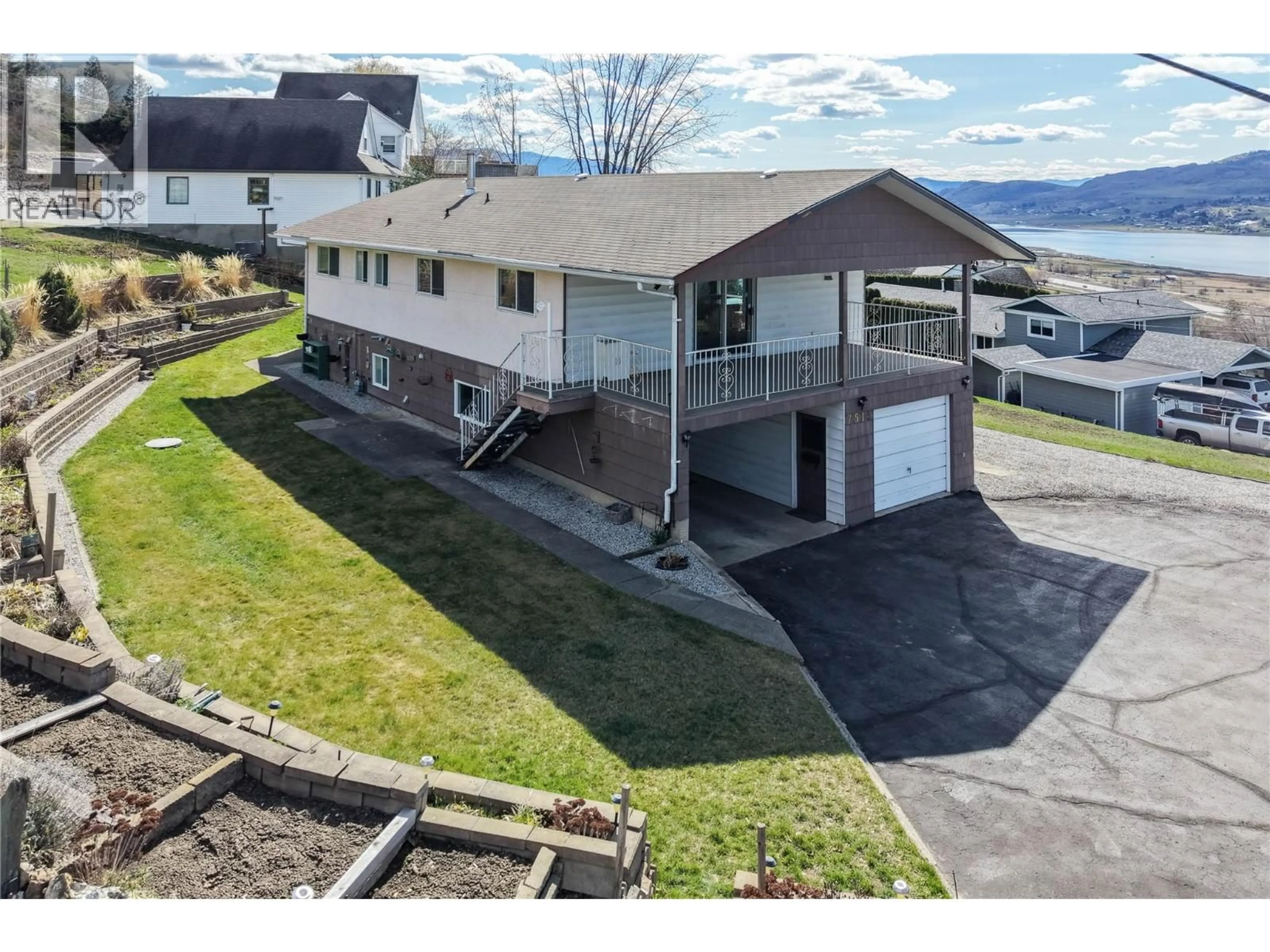 A pic from outside/outdoor area/front of a property/back of a property/a pic from drone, unknown for 7515 L & A ROAD, Vernon British Columbia V1B3S5