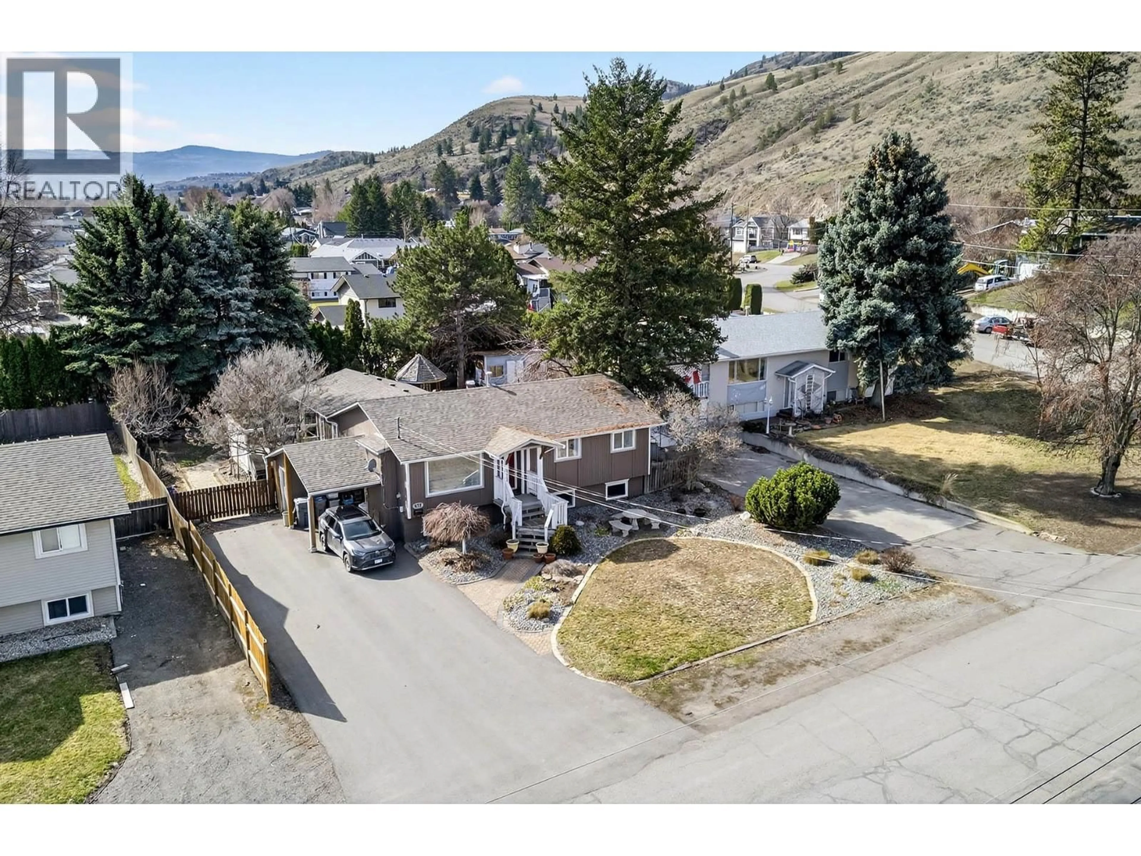 A pic from outside/outdoor area/front of a property/back of a property/a pic from drone, mountain view for 877 MCARTHUR DRIVE, Kamloops British Columbia V2B7L4