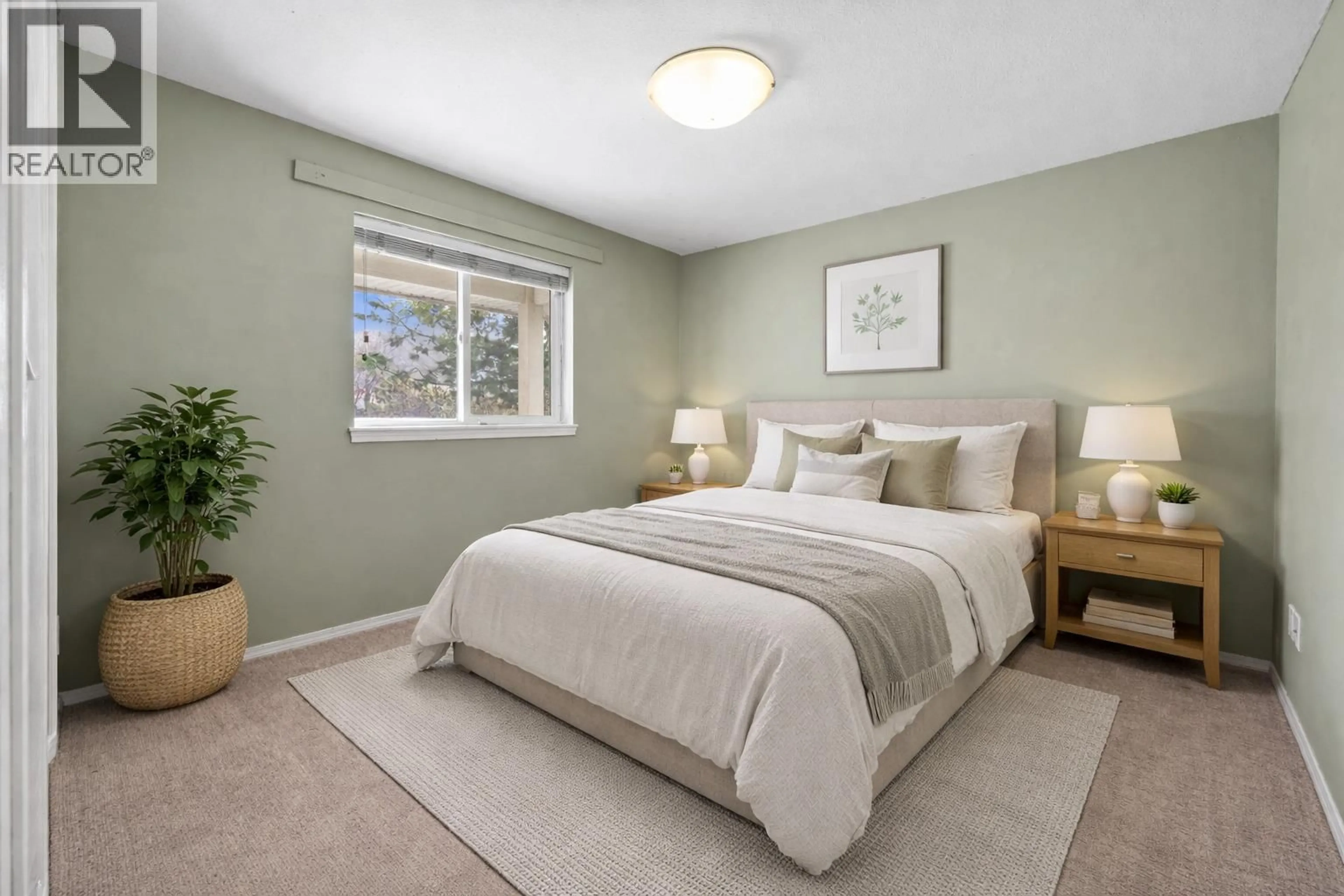 Bedroom with bed, carpet floor for 1322 CORNWALL STREET, Kamloops British Columbia V2B2T4