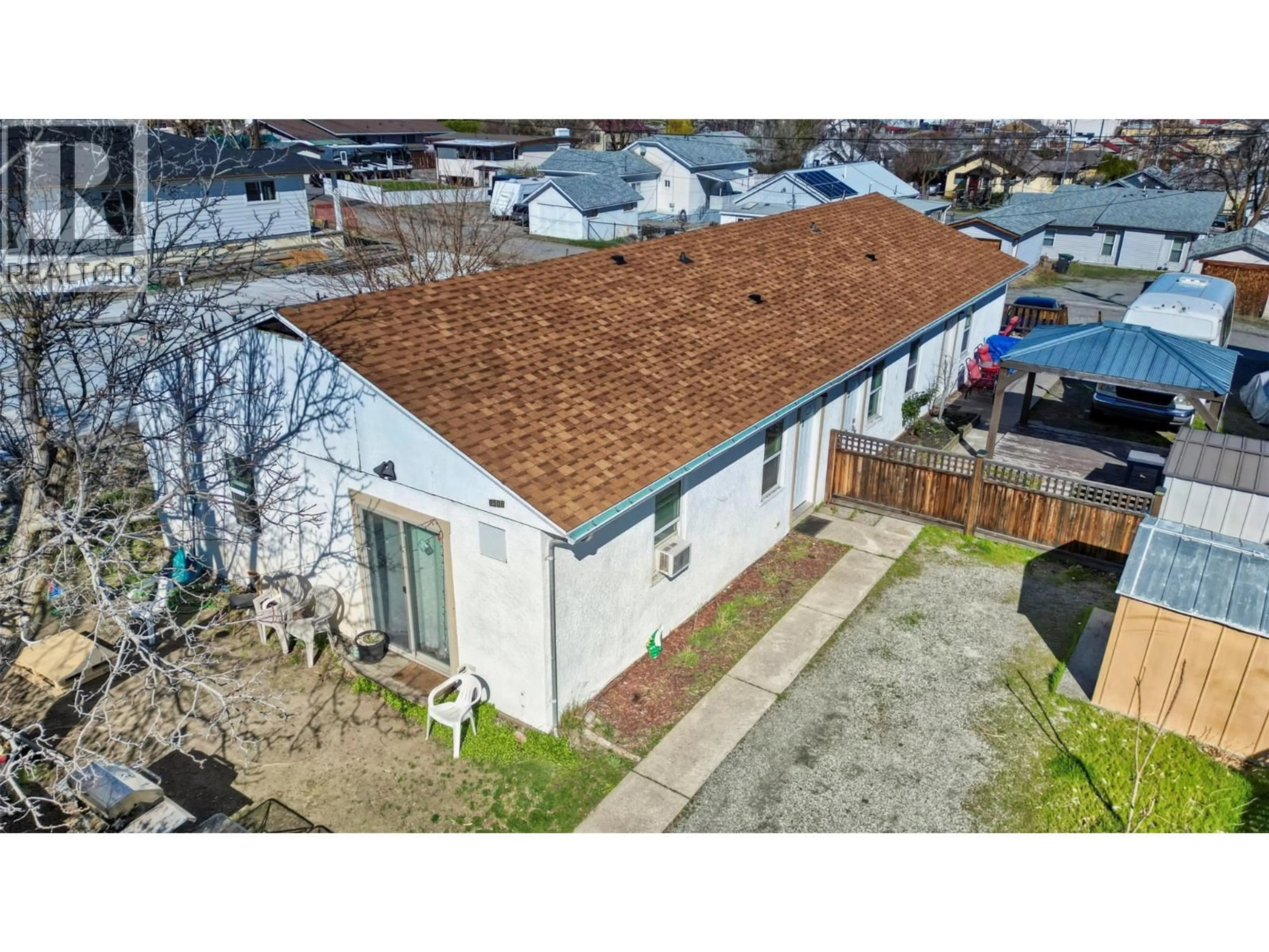 A pic from outside/outdoor area/front of a property/back of a property/a pic from drone, street for 8506 70TH AVENUE, Osoyoos British Columbia V0H1V0