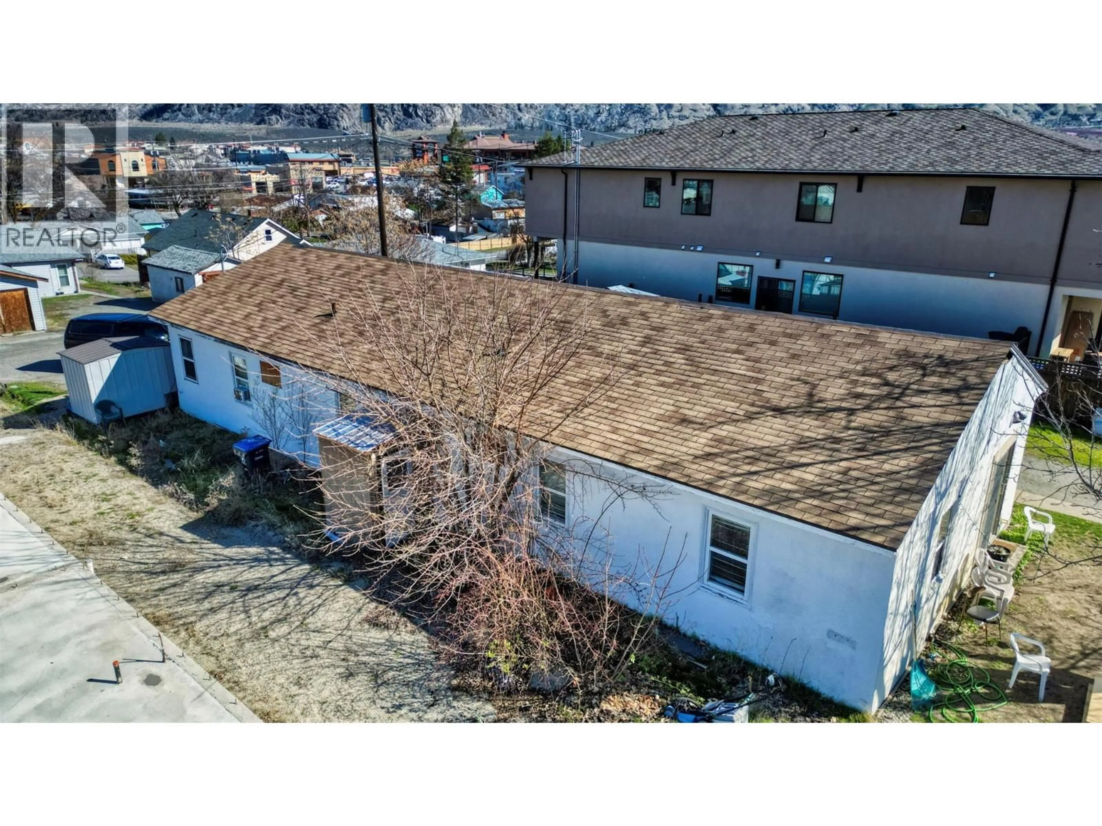 A pic from outside/outdoor area/front of a property/back of a property/a pic from drone, street for 8506 70TH AVENUE, Osoyoos British Columbia V0H1V0