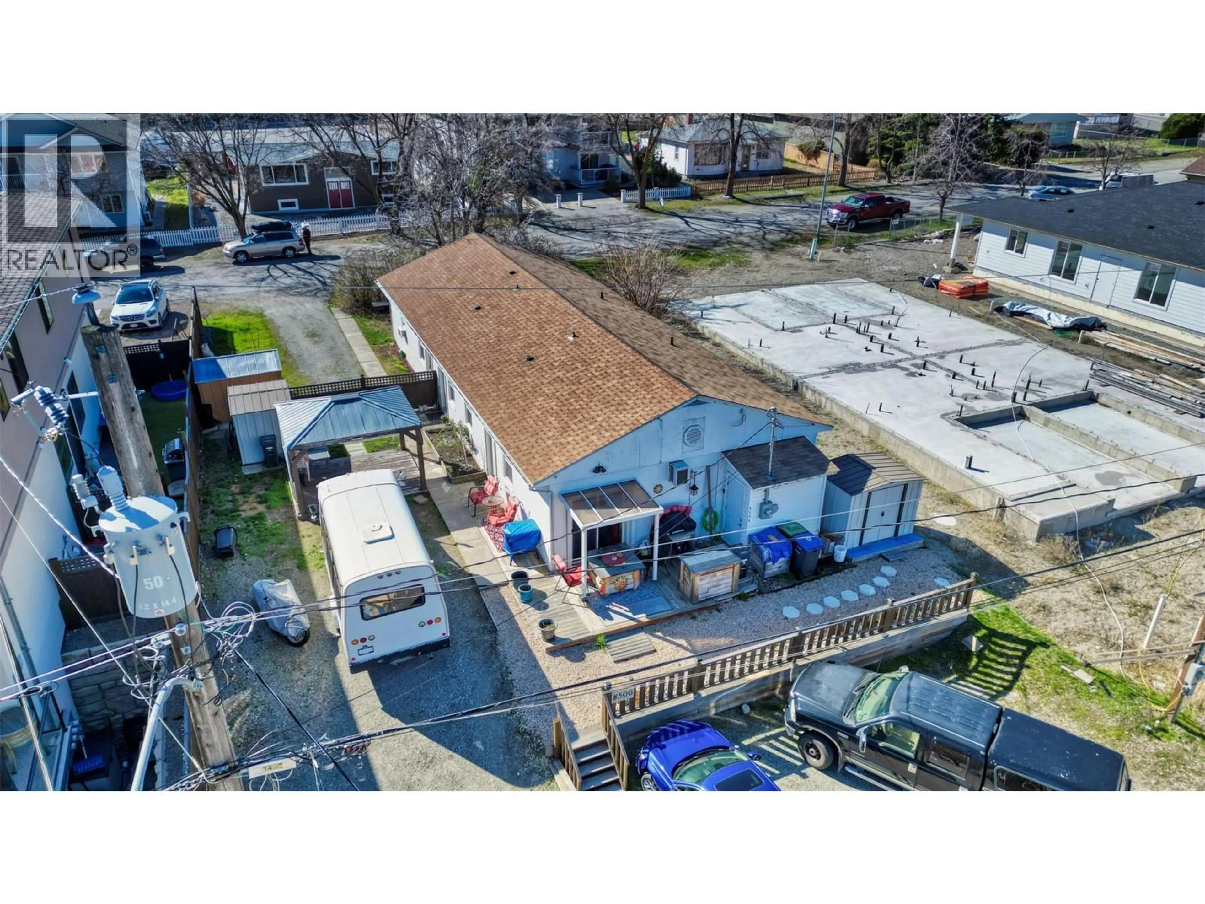 A pic from outside/outdoor area/front of a property/back of a property/a pic from drone, building for 8506 70TH AVENUE, Osoyoos British Columbia V0H1V0