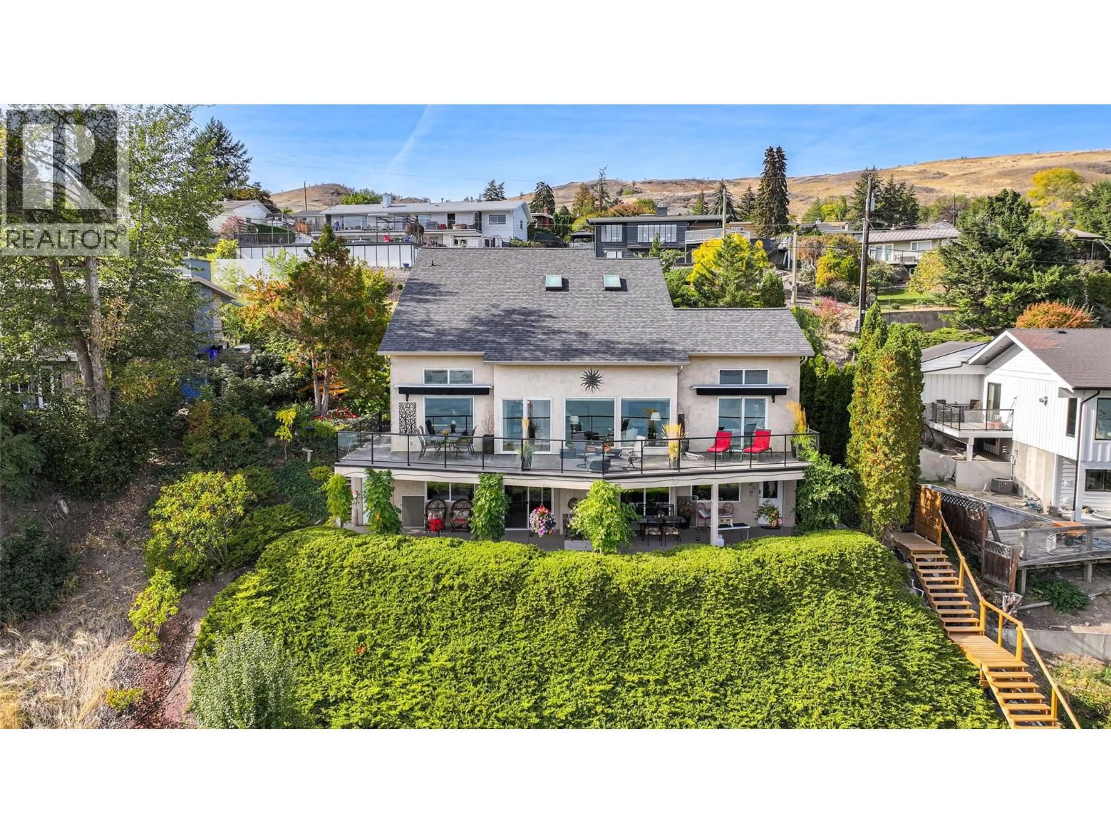 A pic from outside/outdoor area/front of a property/back of a property/a pic from drone, mountain view for 8617 FITZMAURICE DRIVE, Coldstream British Columbia V1B1X4