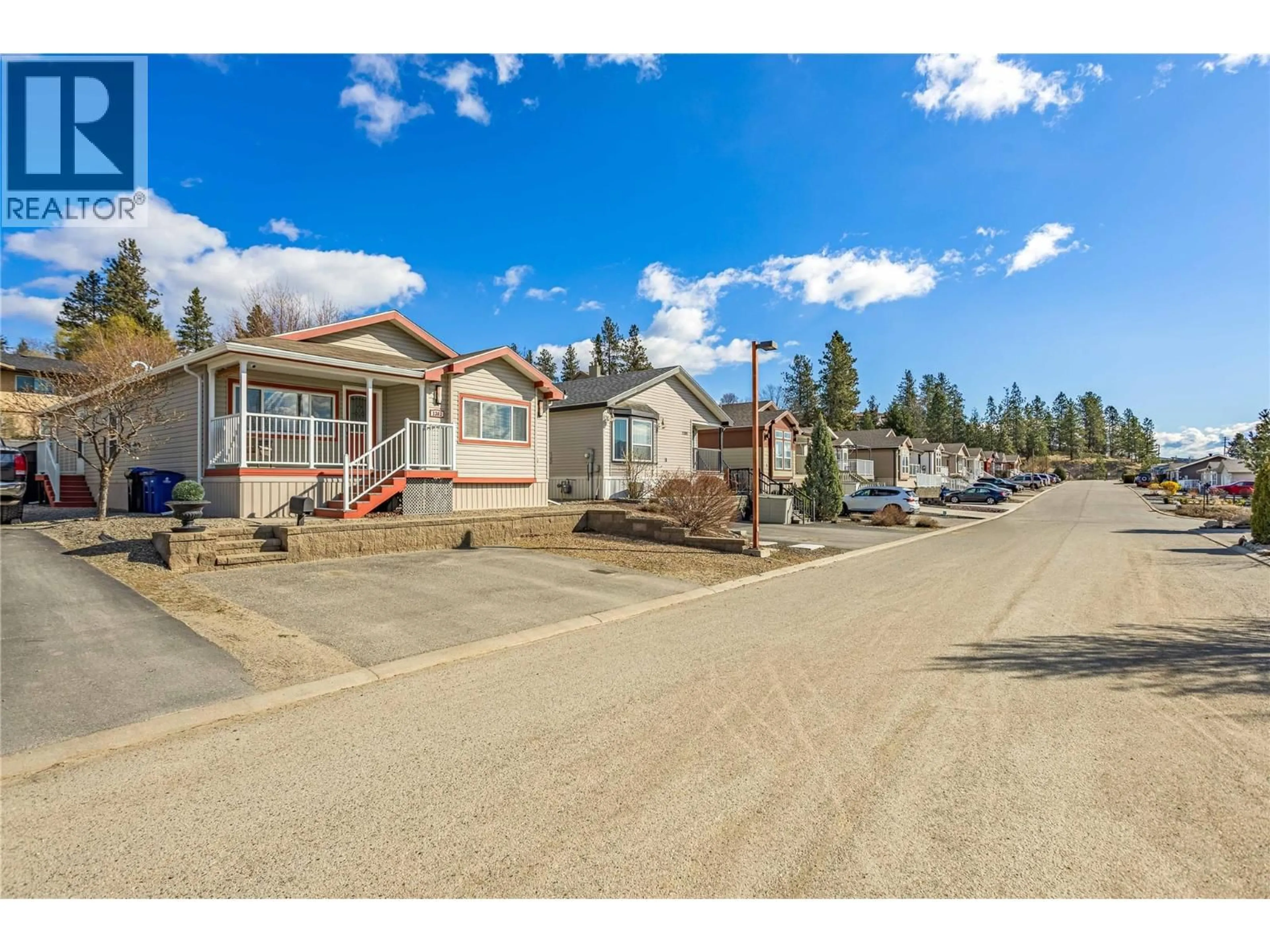A pic from outside/outdoor area/front of a property/back of a property/a pic from drone, street for 1303 - 2440 OLD OKANAGAN HIGHWAY, Westbank British Columbia V4T3A2