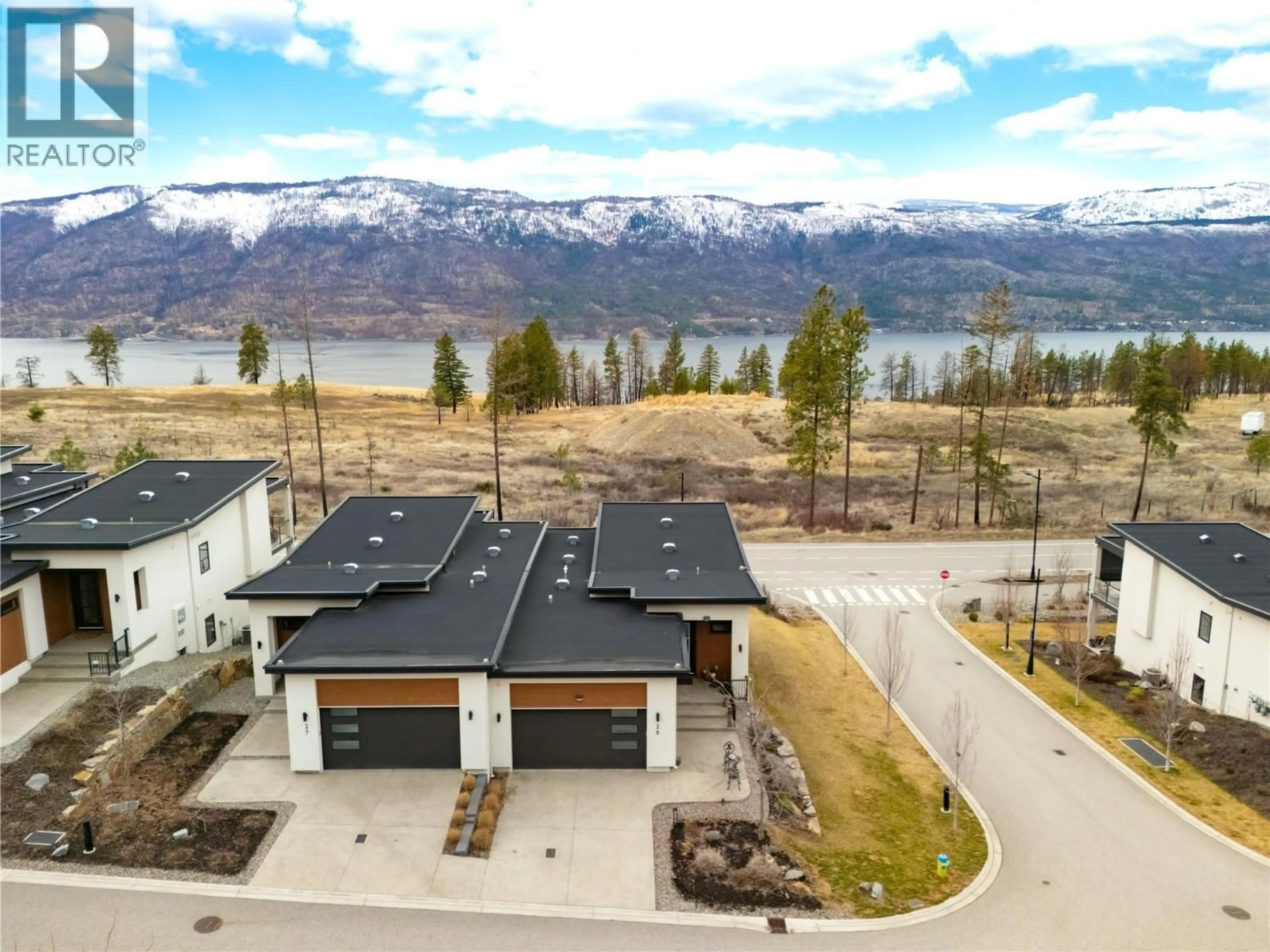 A pic from outside/outdoor area/front of a property/back of a property/a pic from drone, mountain view for 28 - 10100 TYNDALL ROAD, Lake Country British Columbia V4V0A9