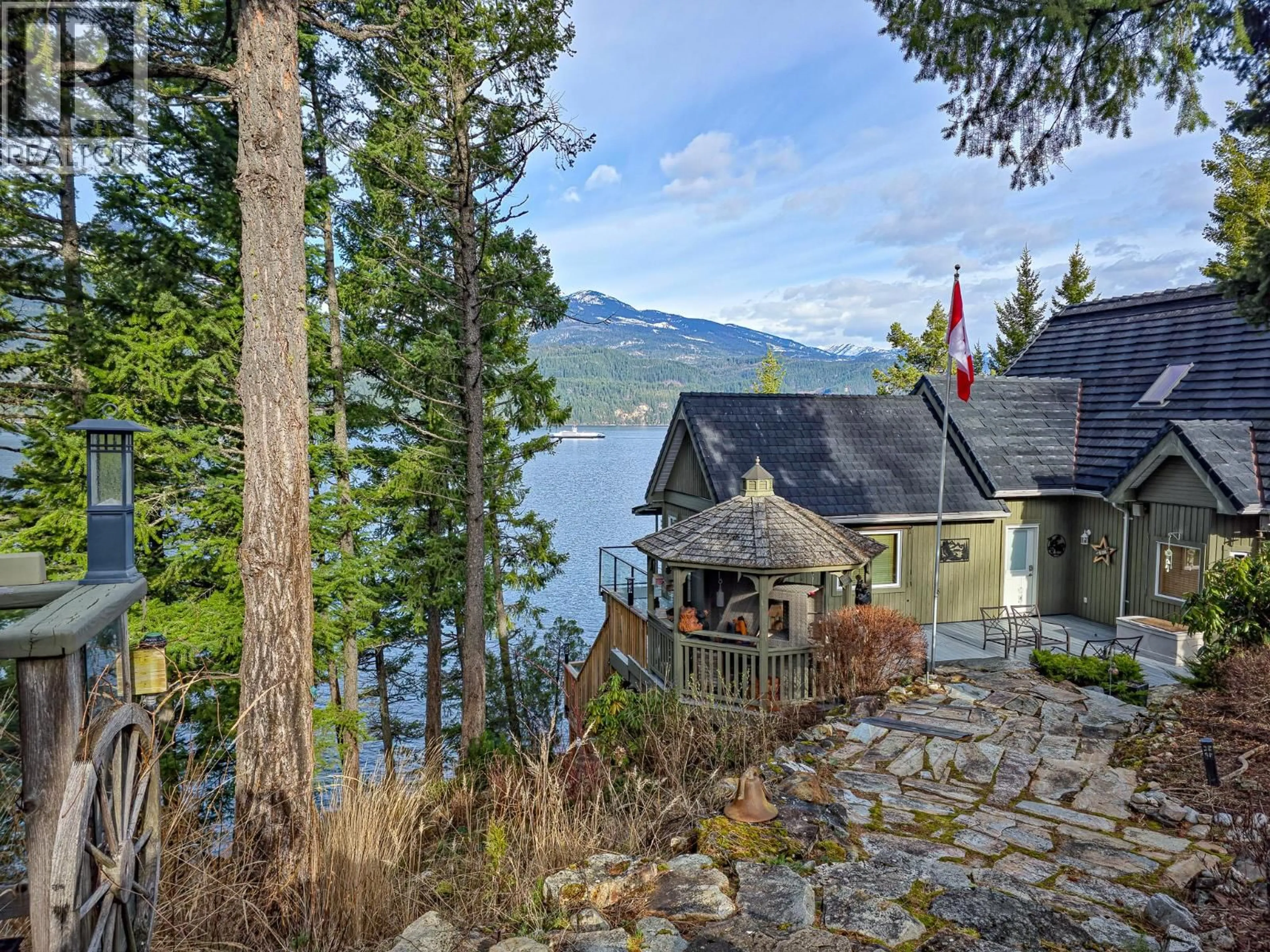 A pic from outside/outdoor area/front of a property/back of a property/a pic from drone, water/lake/river/ocean view for 17222 PILOT BAY ROAD, Kootenay Bay British Columbia V0B1E0