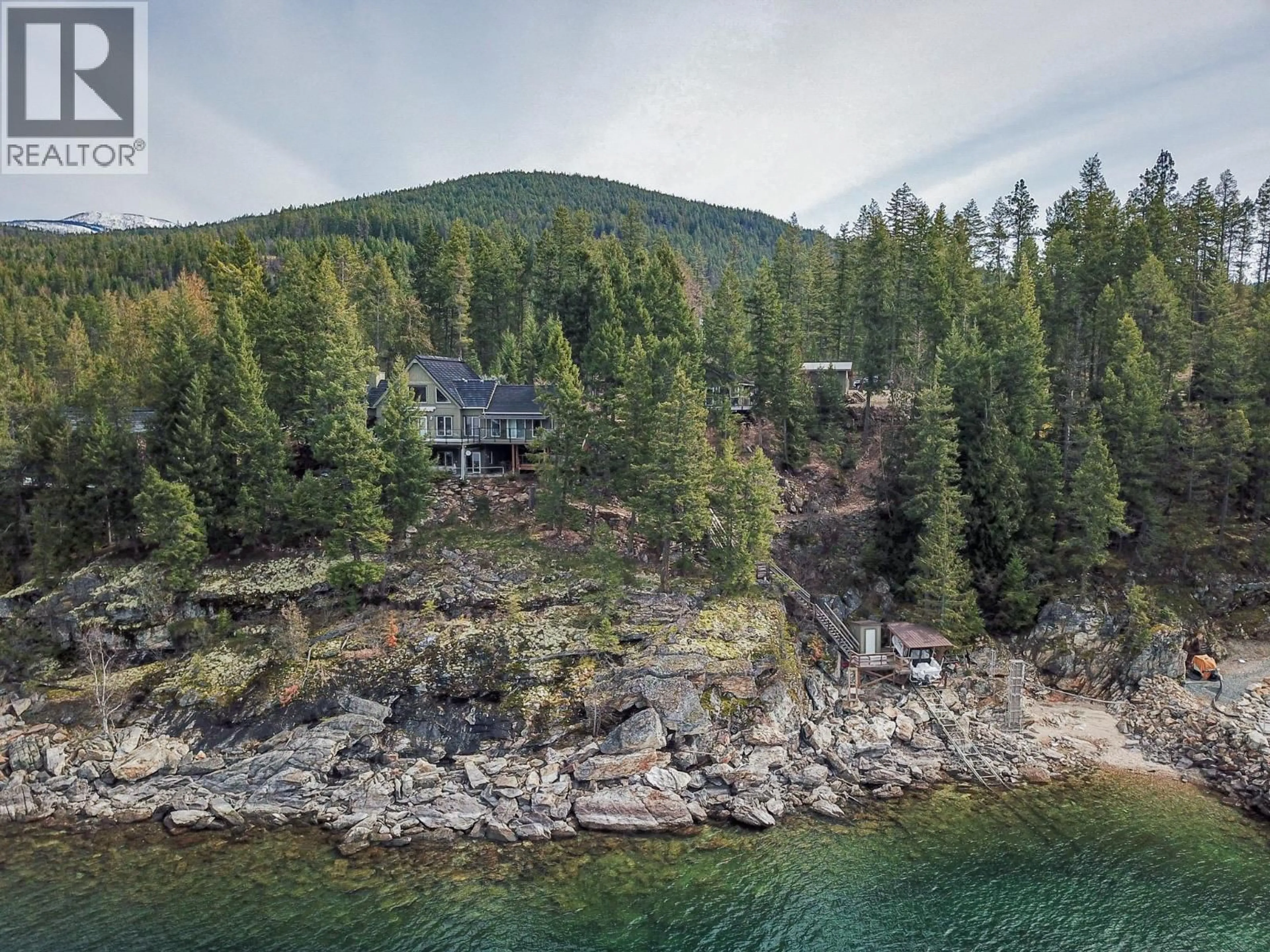 A pic from outside/outdoor area/front of a property/back of a property/a pic from drone, water/lake/river/ocean view for 17222 PILOT BAY ROAD, Kootenay Bay British Columbia V0B1E0