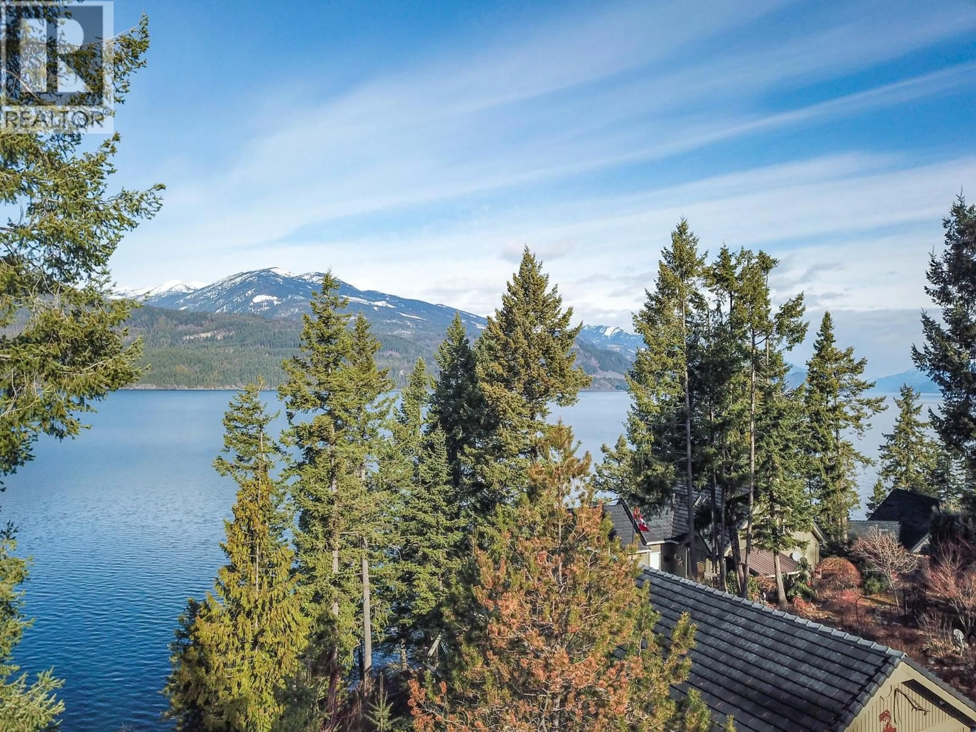 A pic from outside/outdoor area/front of a property/back of a property/a pic from drone, water/lake/river/ocean view for 17222 PILOT BAY ROAD, Kootenay Bay British Columbia V0B1E0
