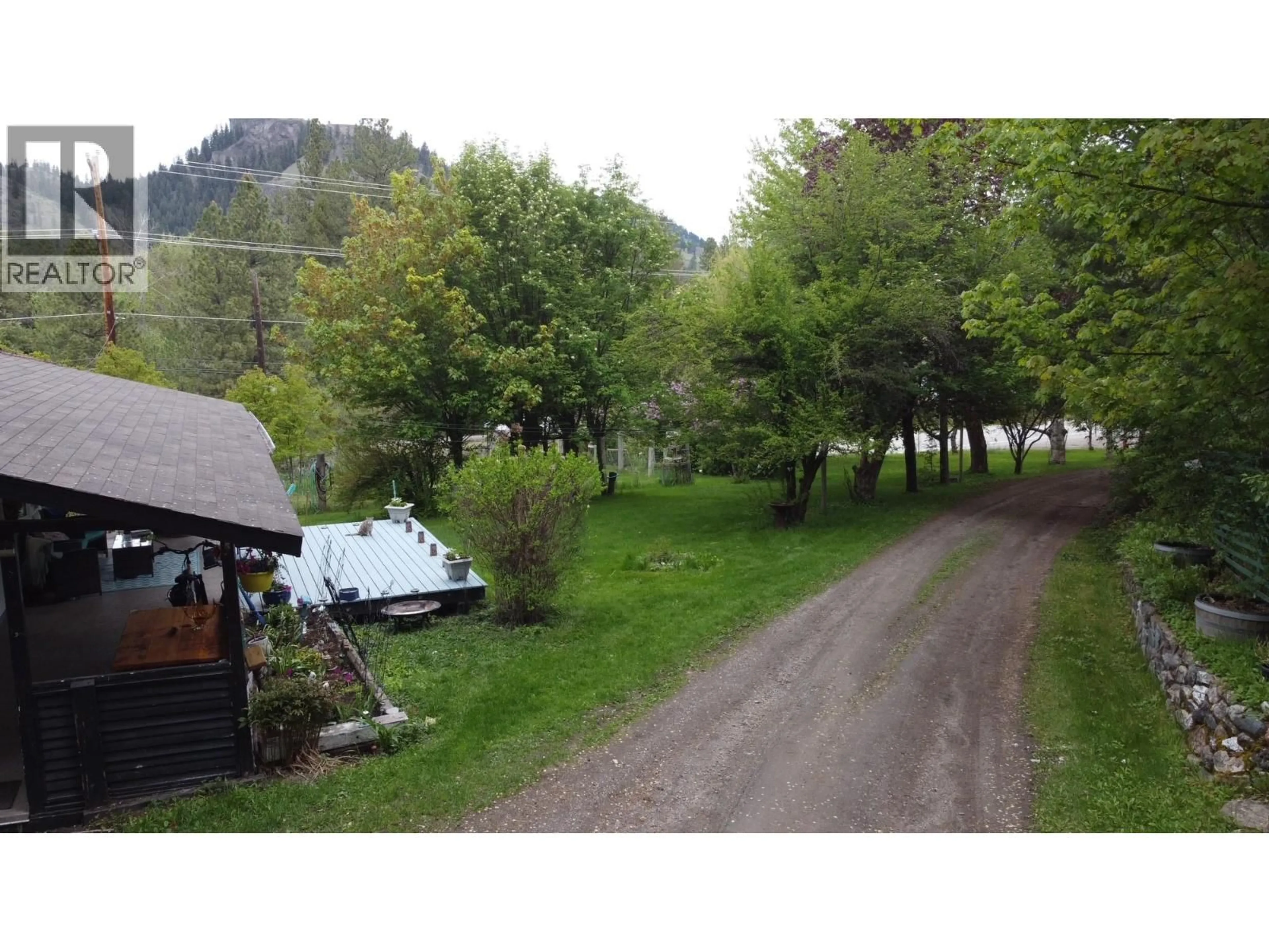 A pic from outside/outdoor area/front of a property/back of a property/a pic from drone, forest/trees view for 3900 HIGHWAY 3 OTHER, Rock Creek British Columbia V0H1Y0
