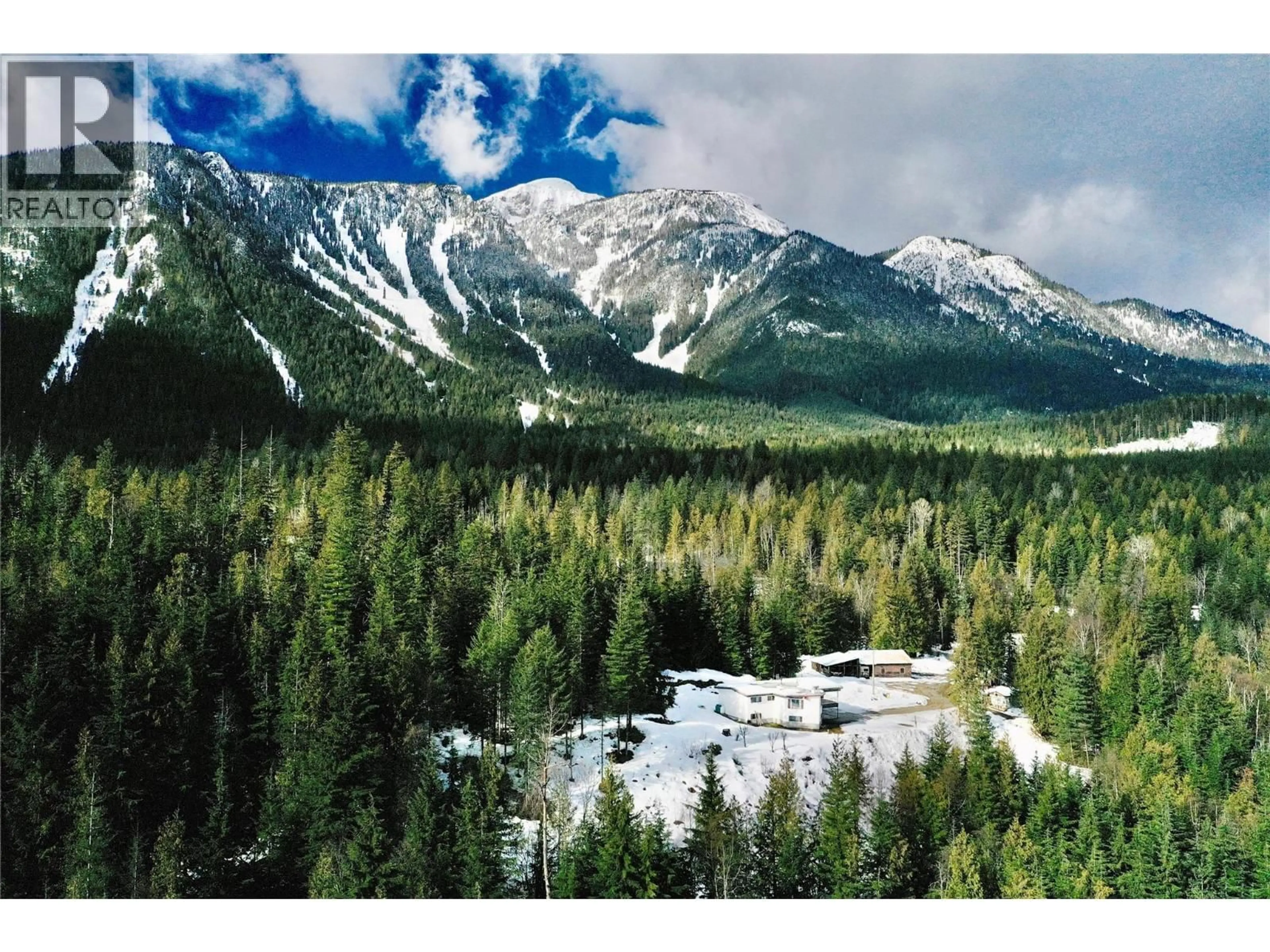 A pic from outside/outdoor area/front of a property/back of a property/a pic from drone, mountain view for 2180 CLOUGH ROAD, Revelstoke British Columbia V0E2S0