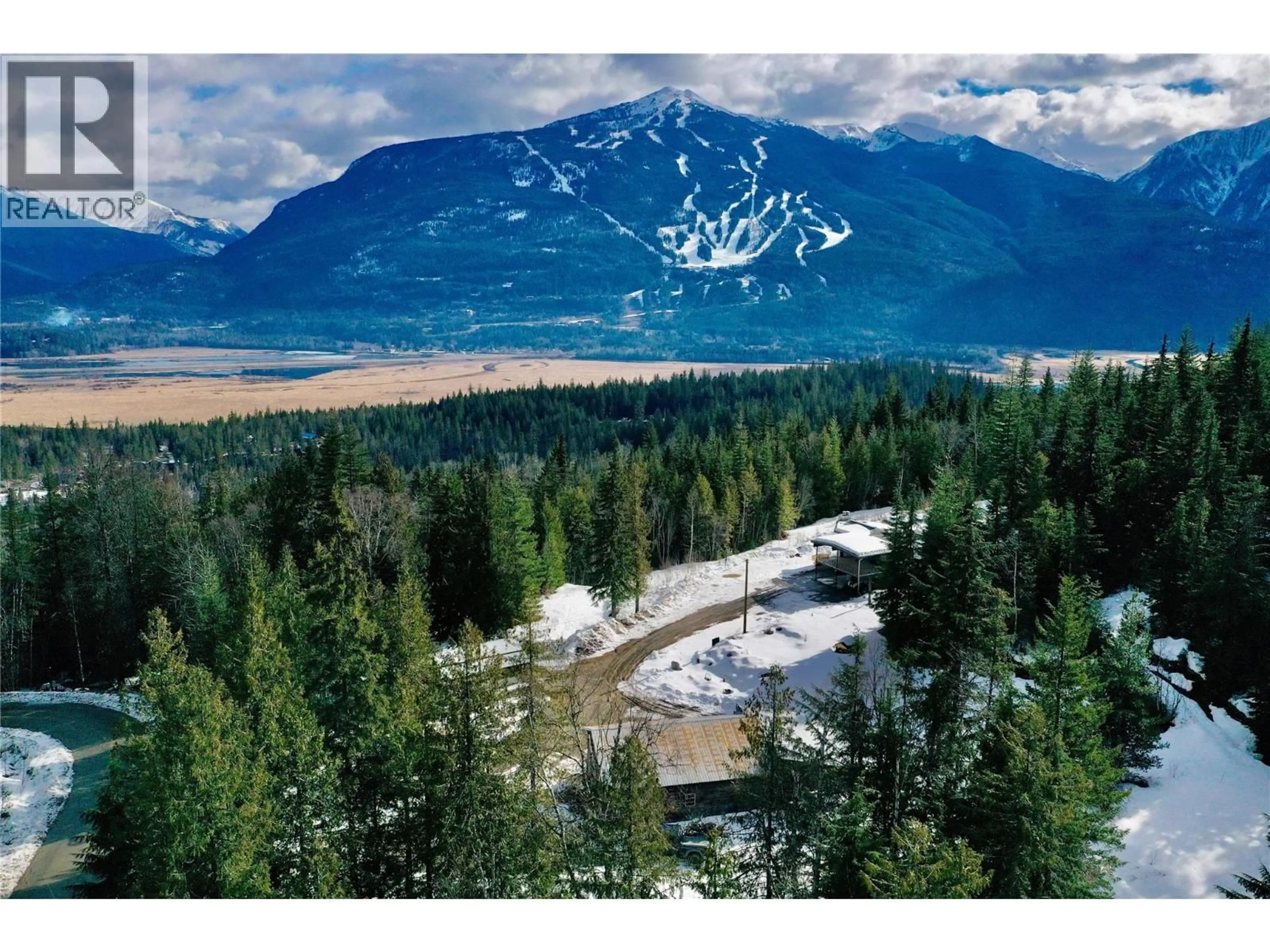 A pic from outside/outdoor area/front of a property/back of a property/a pic from drone, mountain view for 2180 CLOUGH ROAD, Revelstoke British Columbia V0E2S0