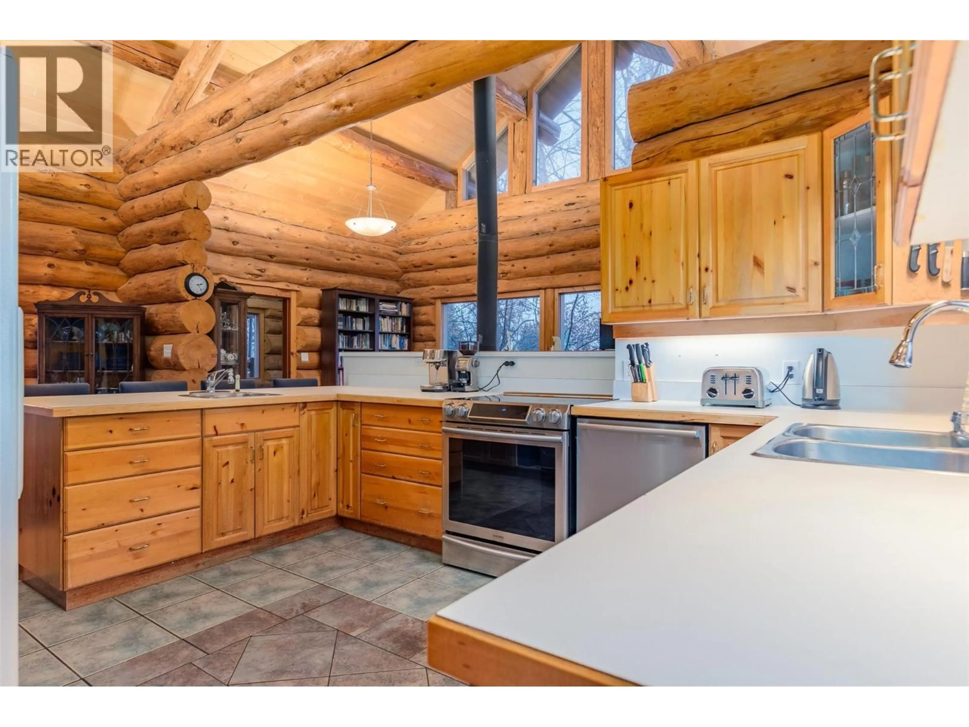 Open concept kitchen, wood/laminate floor for 2266 FIFTH AVENUE, Rossland British Columbia V0G1Y0