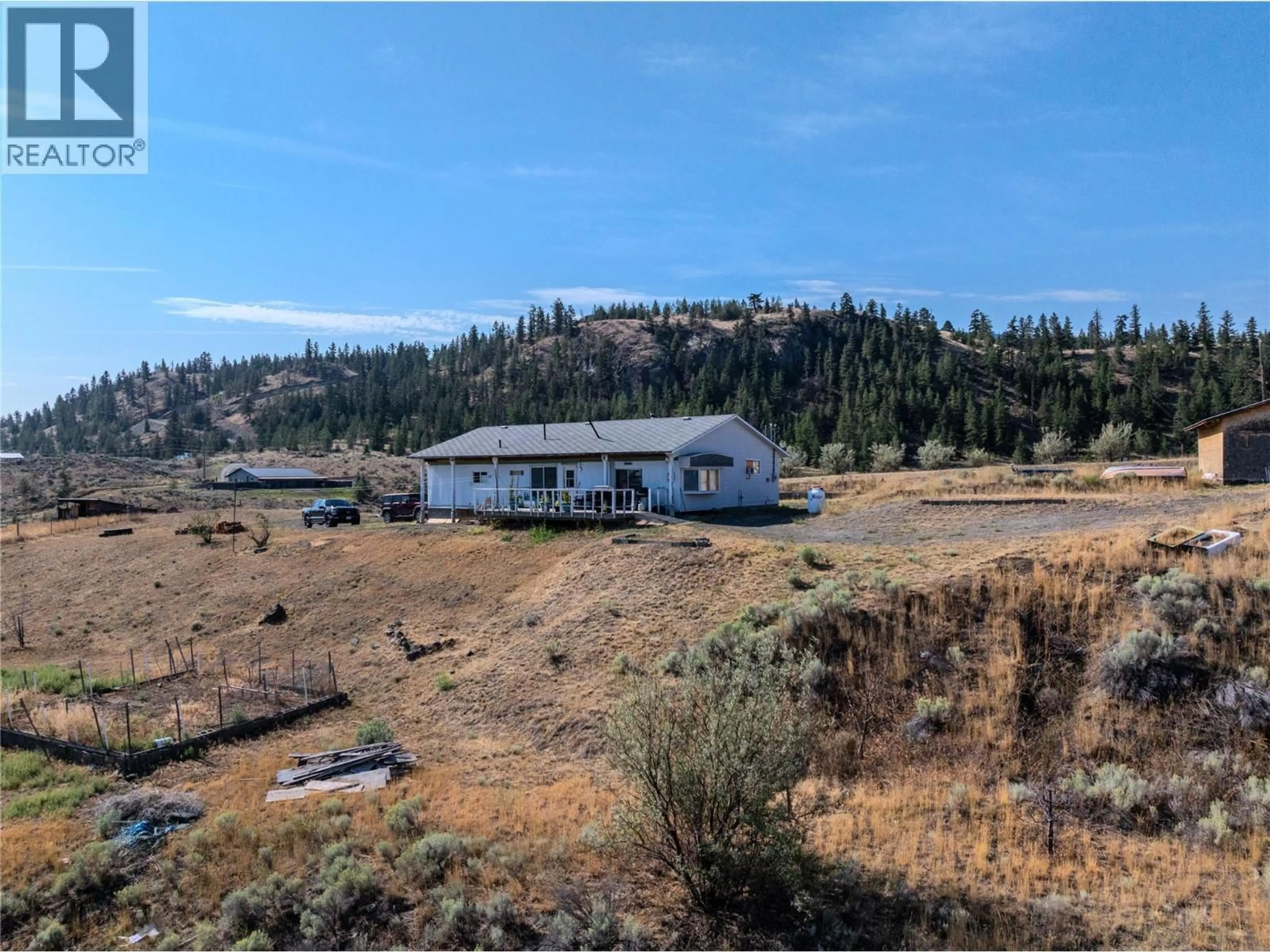 A pic from outside/outdoor area/front of a property/back of a property/a pic from drone, mountain view for 5589 BEATON ROAD, Kamloops British Columbia V1S2A4