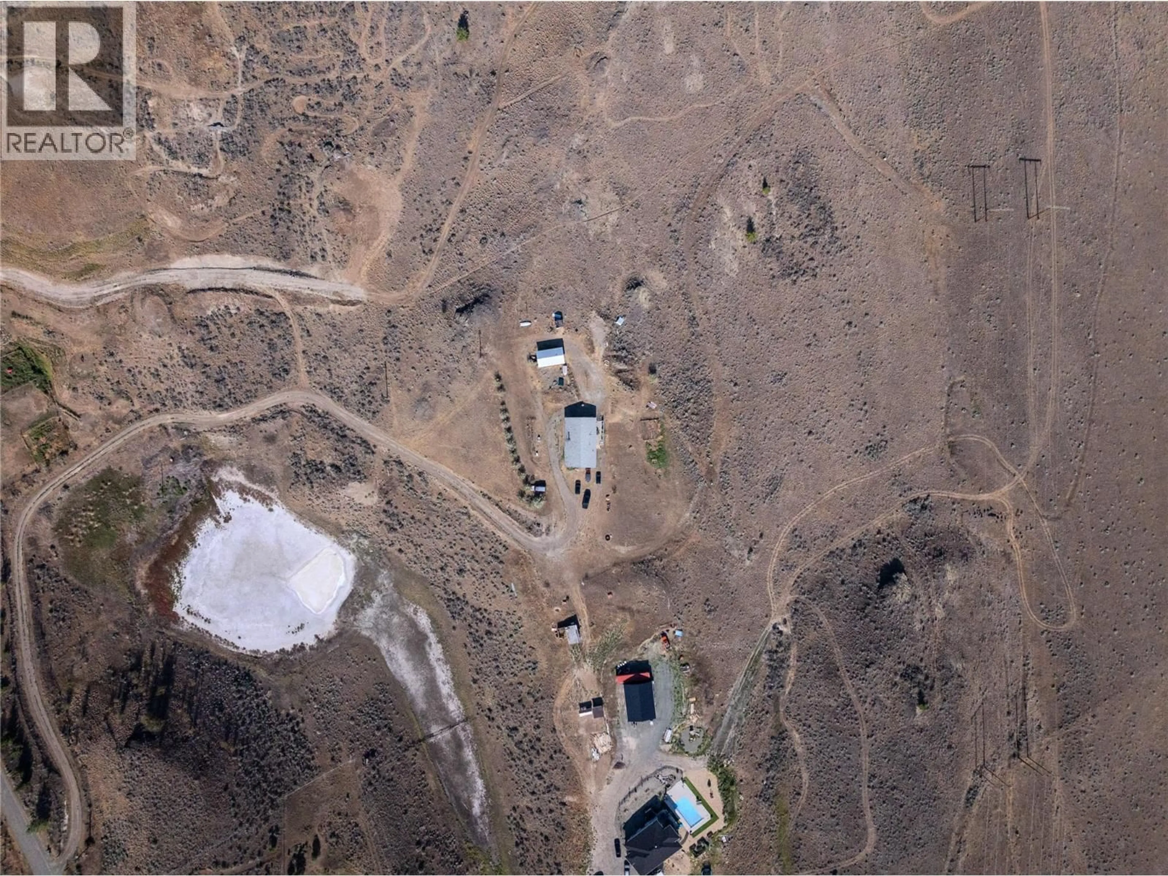 A pic from outside/outdoor area/front of a property/back of a property/a pic from drone, street for 5589 BEATON ROAD, Kamloops British Columbia V1S2A4