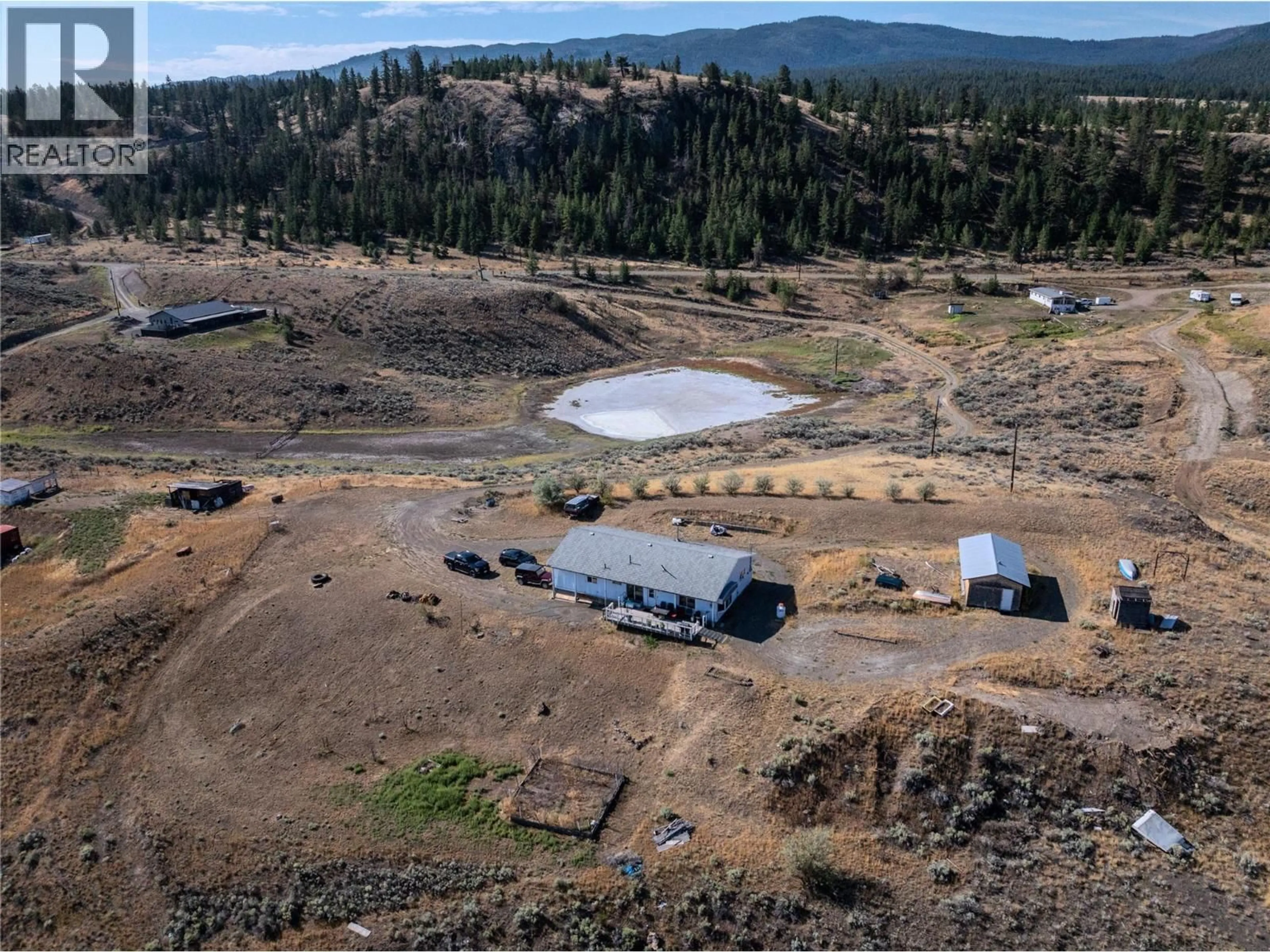 A pic from outside/outdoor area/front of a property/back of a property/a pic from drone, mountain view for 5589 BEATON ROAD, Kamloops British Columbia V1S2A4