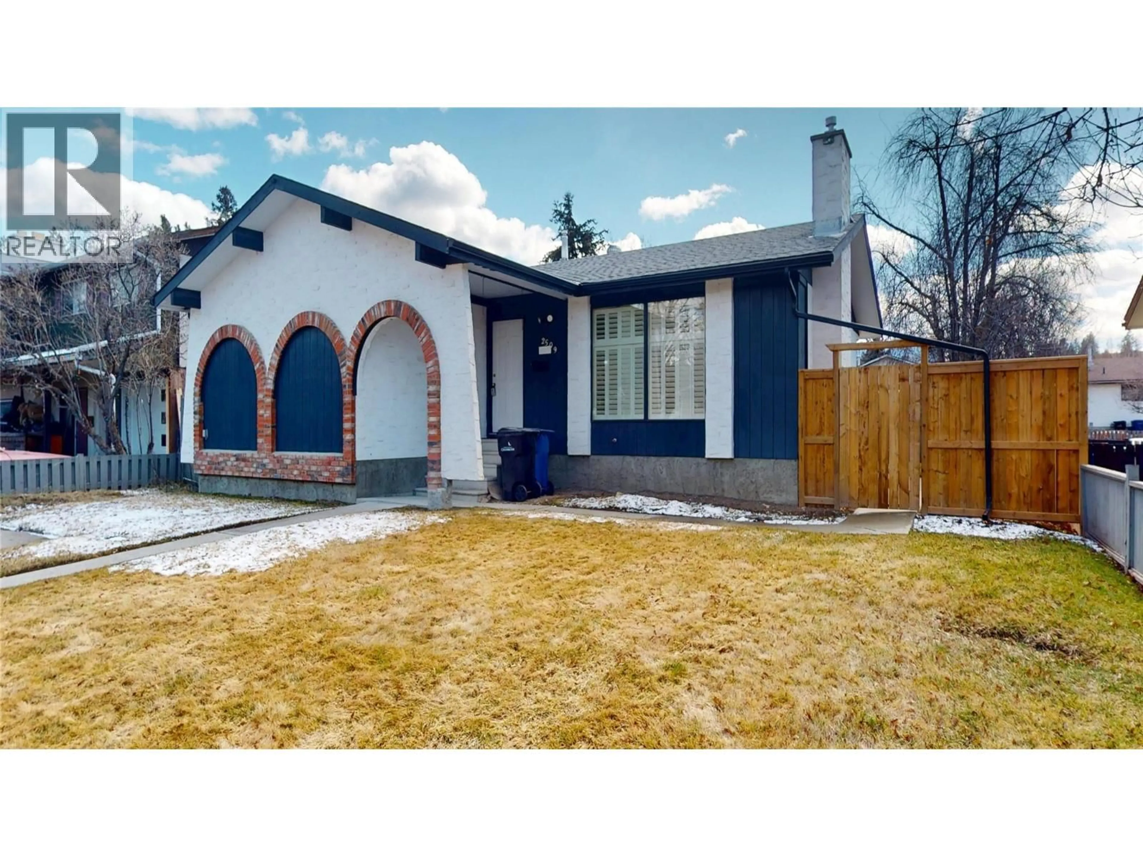 Home with brick exterior material, street for 2509 3RD STREET SOUTH, Cranbrook British Columbia V1C4W4
