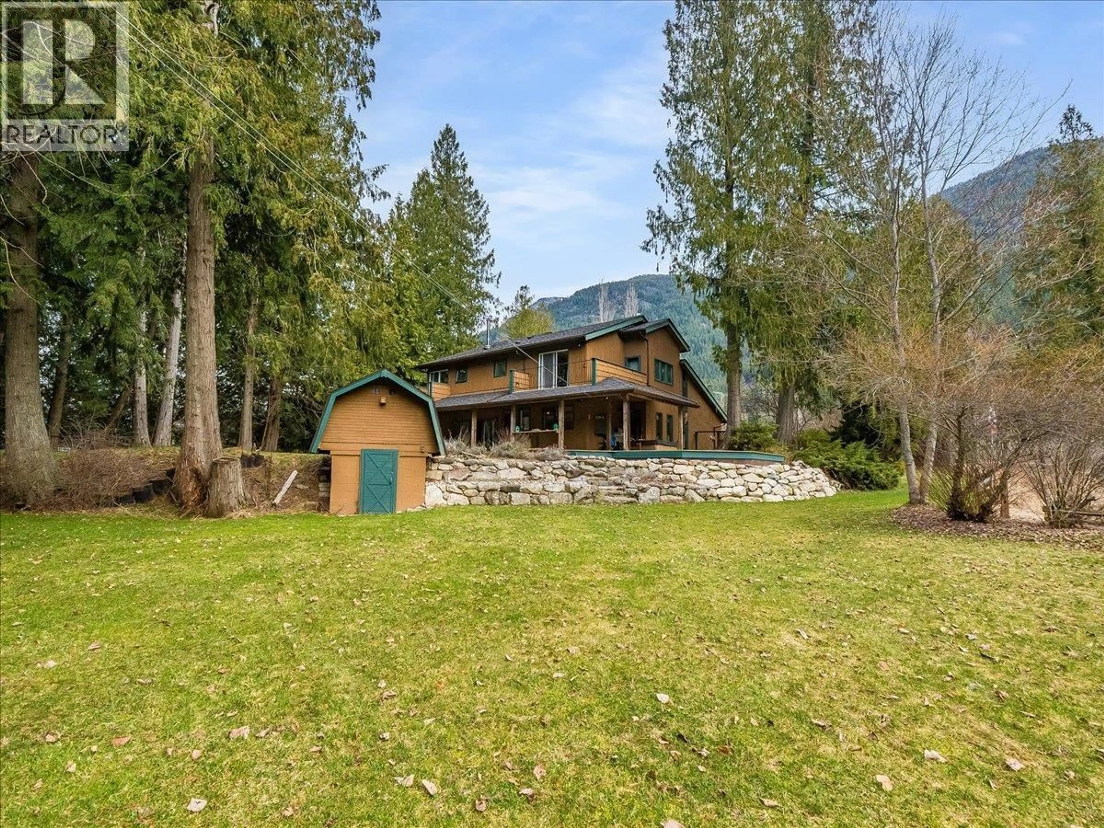 A pic from outside/outdoor area/front of a property/back of a property/a pic from drone, water/lake/river/ocean view for 2827 EVIN ROAD, Slocan Park British Columbia V0G2E0