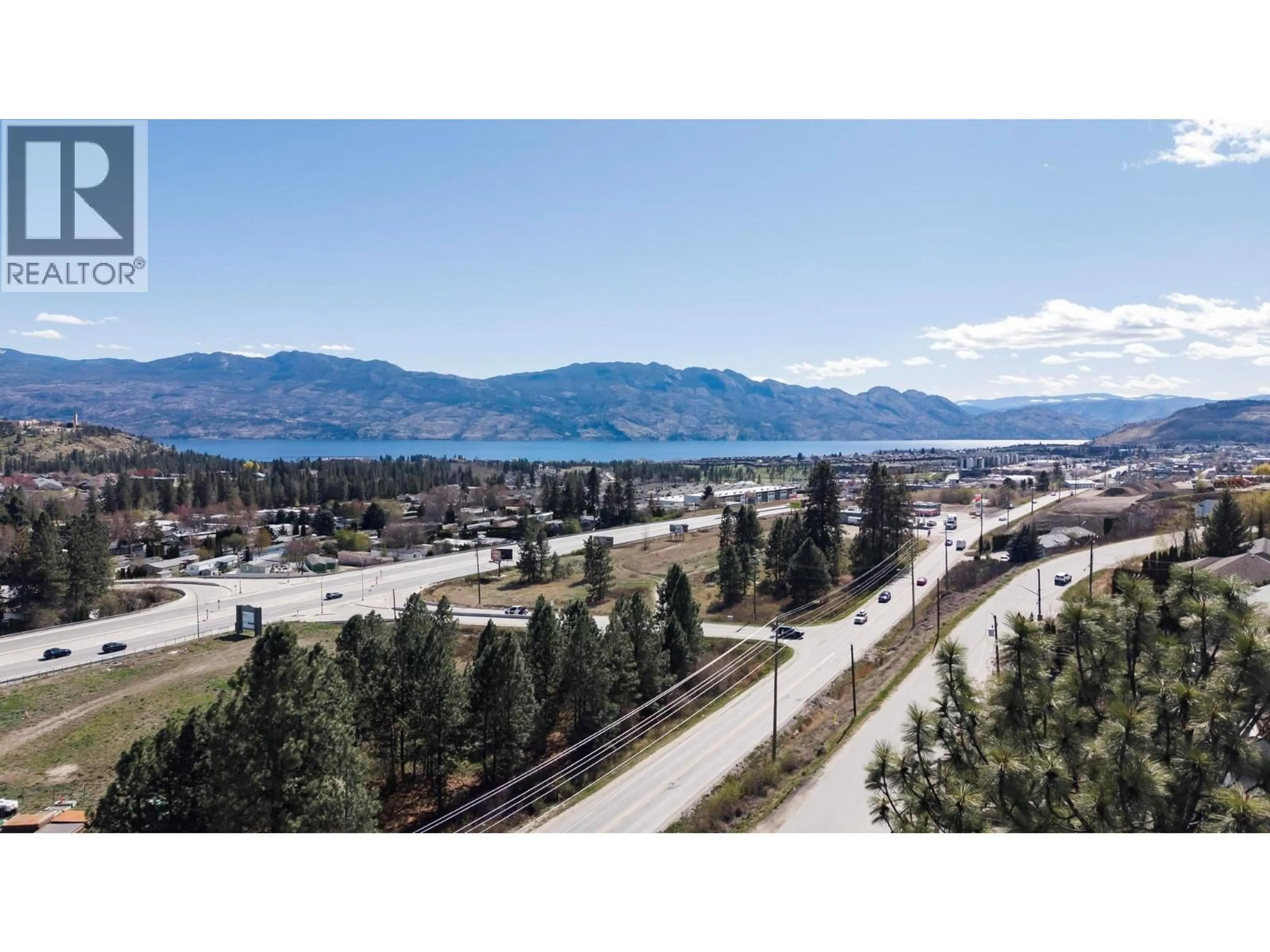 A pic from outside/outdoor area/front of a property/back of a property/a pic from drone, mountain view for 2048 SHAMROCK DRIVE, West Kelowna British Columbia V4T1T8