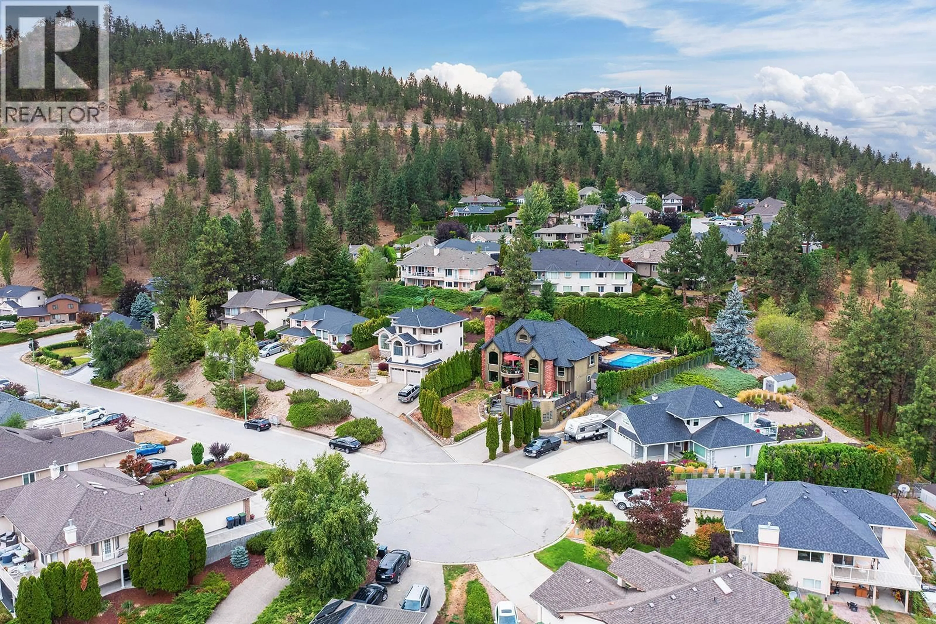 A pic from outside/outdoor area/front of a property/back of a property/a pic from drone, mountain view for 2376 NAHANNI COURT, Kelowna British Columbia V1V1N1