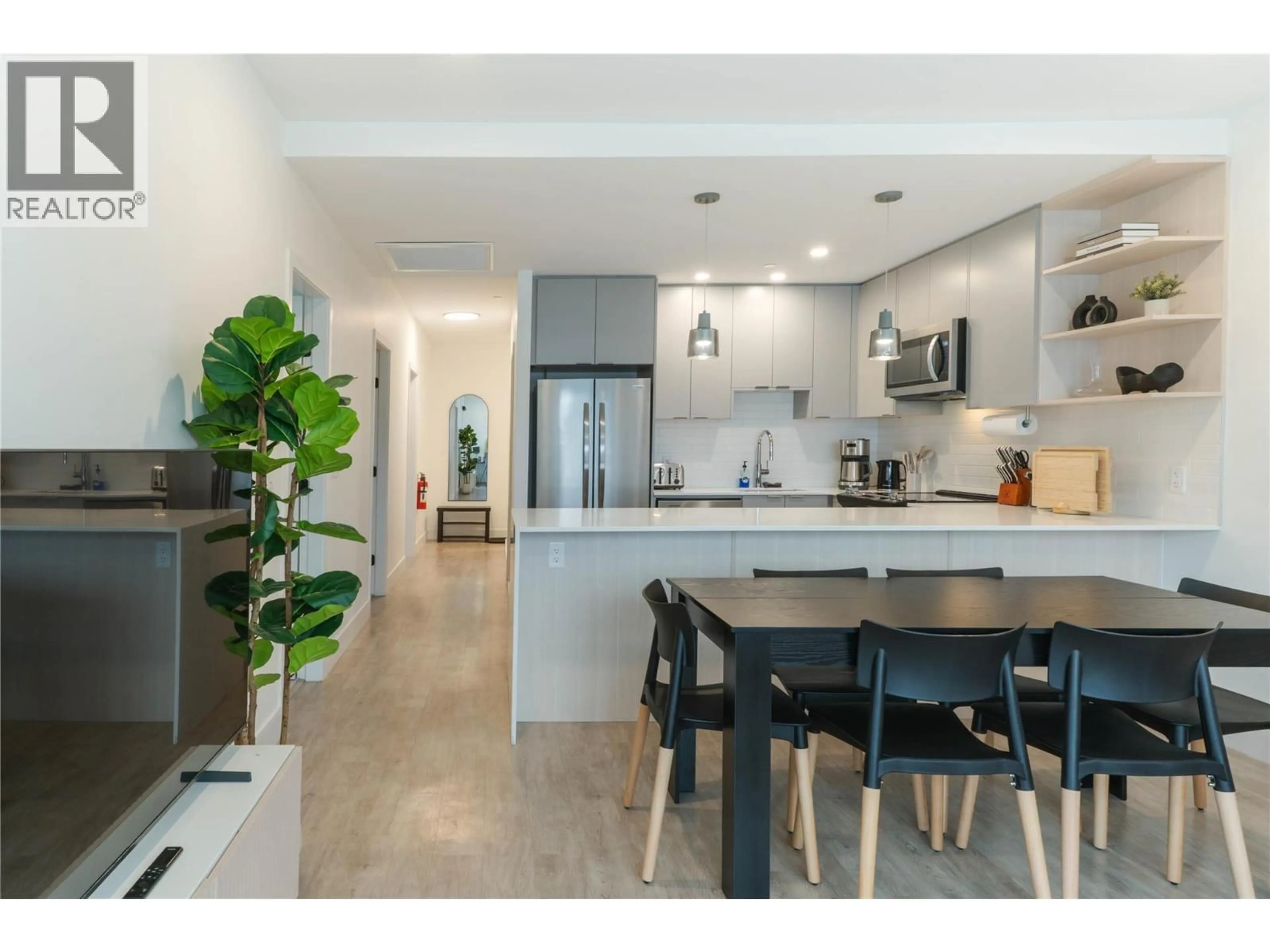 Open concept kitchen, ceramic/tile floor for 1401 - 1701 COURSIER AVENUE, Revelstoke British Columbia V0E2S0