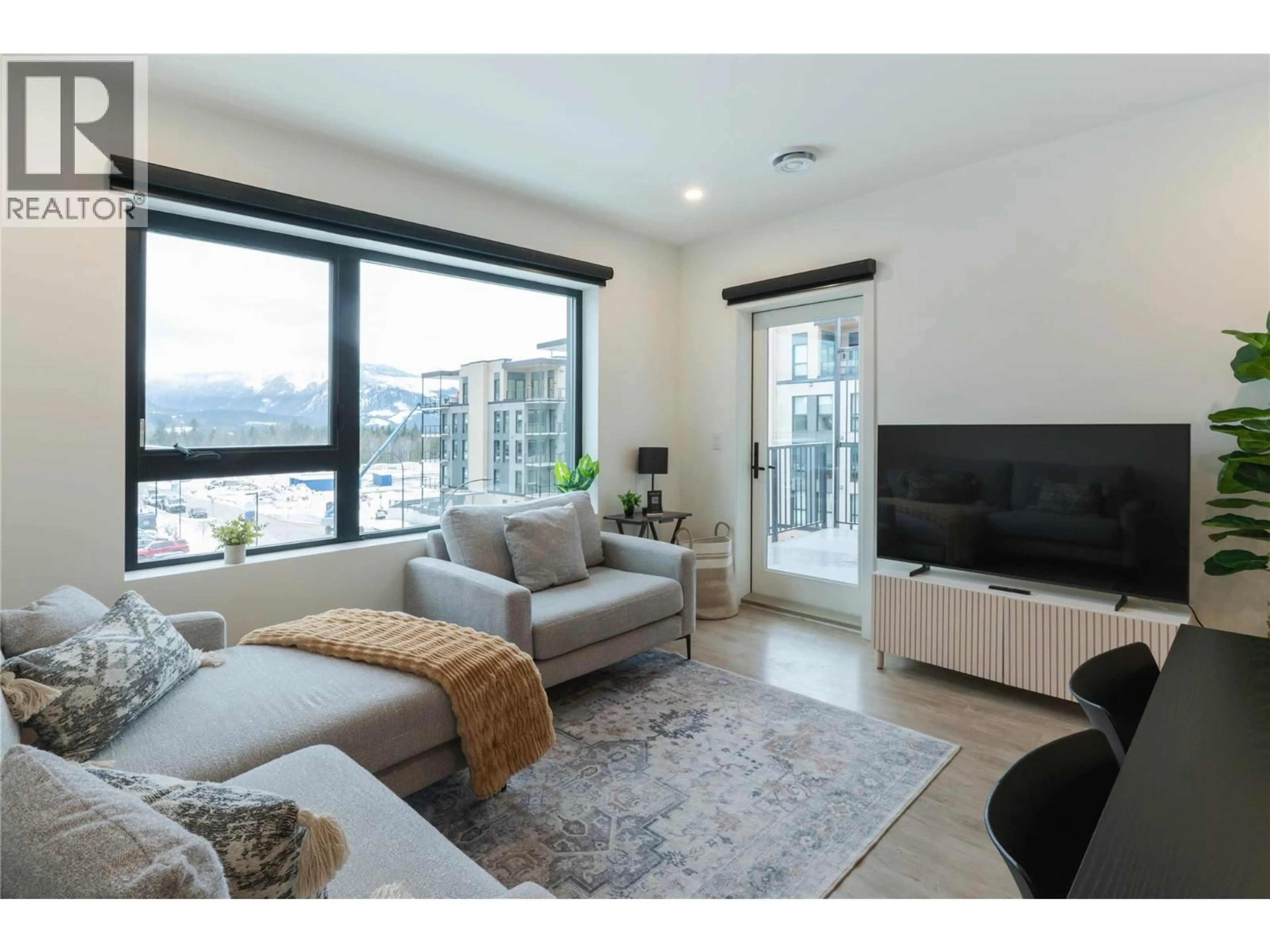 Living room with furniture, unknown for 1401 - 1701 COURSIER AVENUE, Revelstoke British Columbia V0E2S0