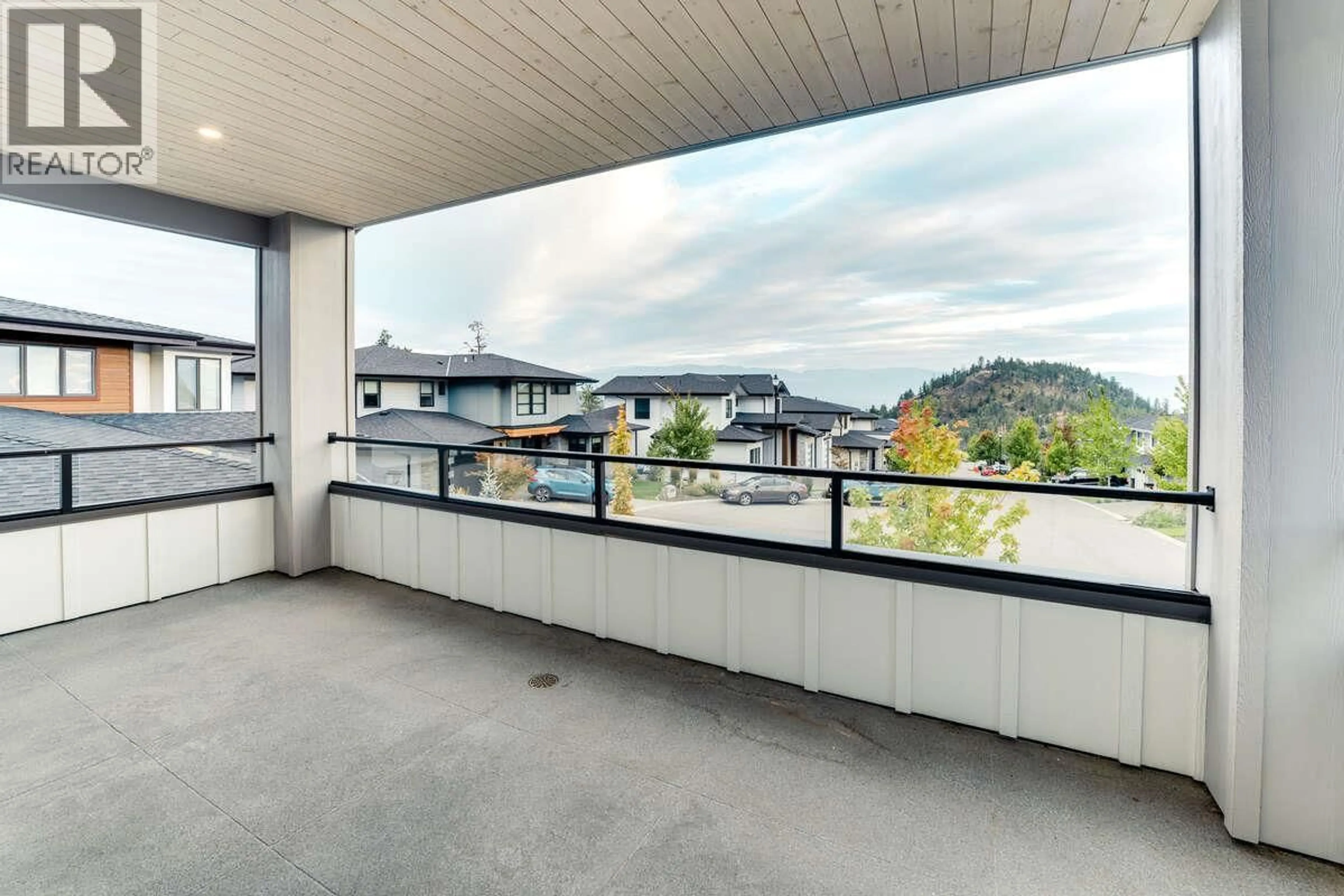 Balcony in the apartment, city buildings view from balcony for 278 SUMMER WOOD DRIVE, Kelowna British Columbia V1V3C6