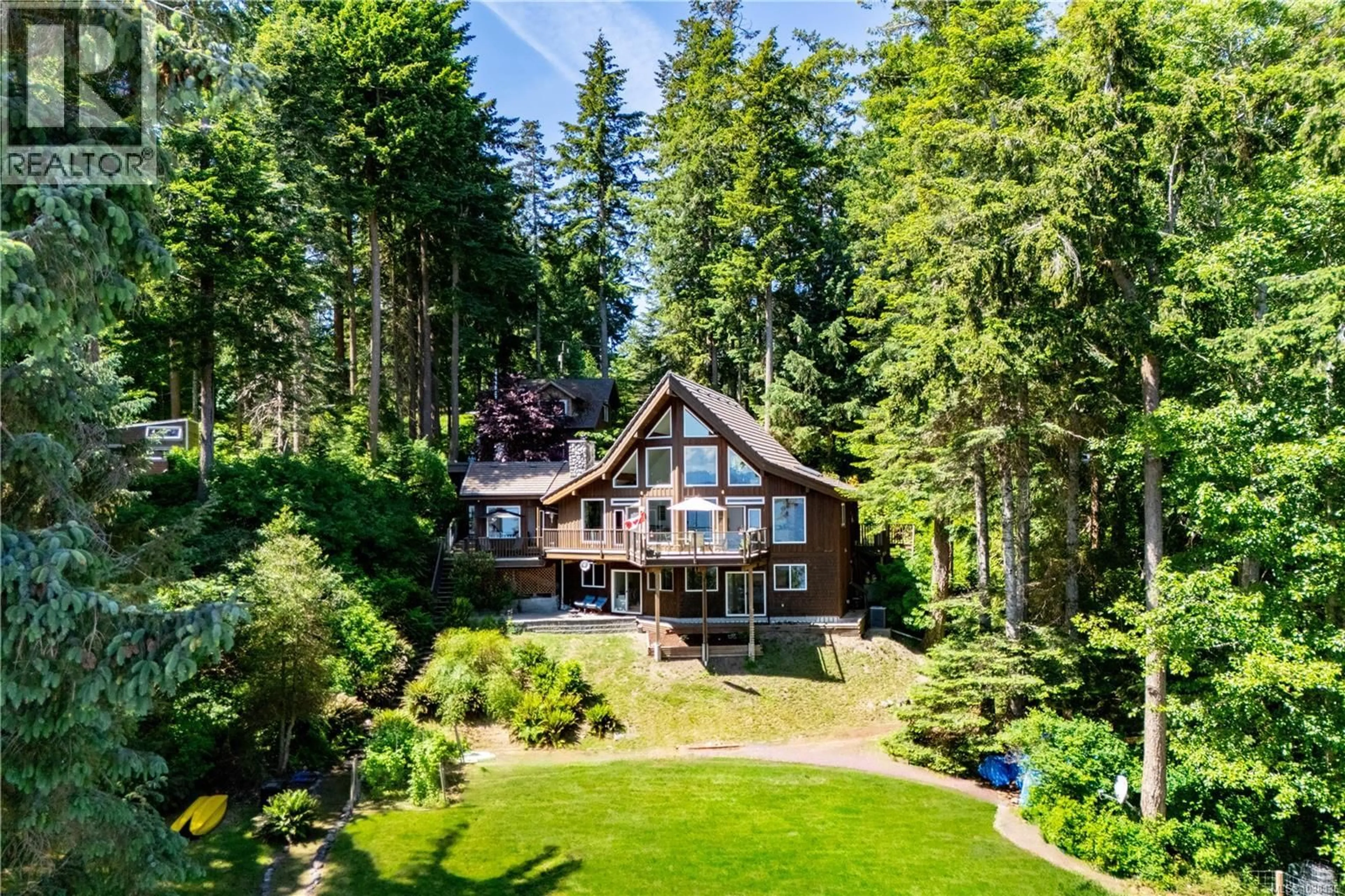 A pic from outside/outdoor area/front of a property/back of a property/a pic from drone, unknown for 145 PETROGLYPH WAY, Quadra Island British Columbia V0P1N0