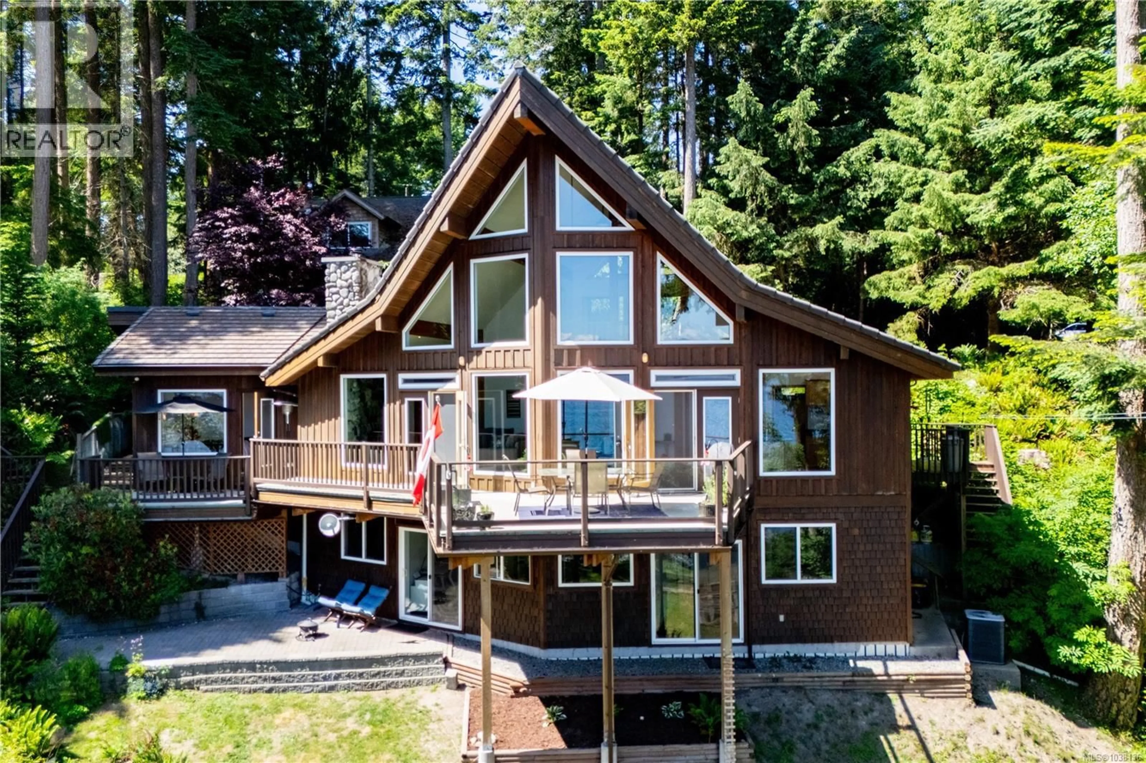A pic from outside/outdoor area/front of a property/back of a property/a pic from drone, water/lake/river/ocean view for 145 PETROGLYPH WAY, Quadra Island British Columbia V0P1N0
