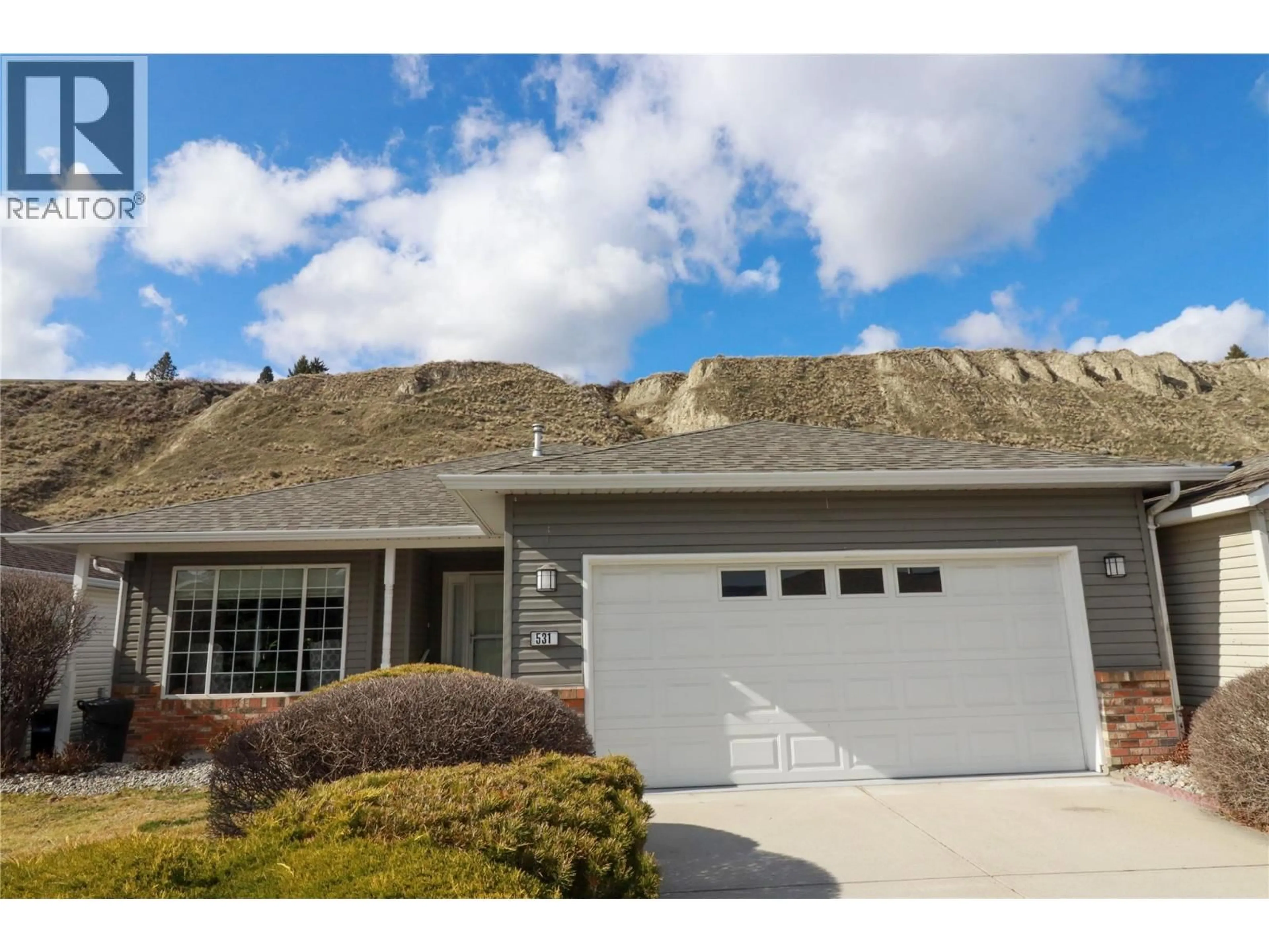 Home with vinyl exterior material, mountain view for 531 RED WING DRIVE, Penticton British Columbia V2A8N7
