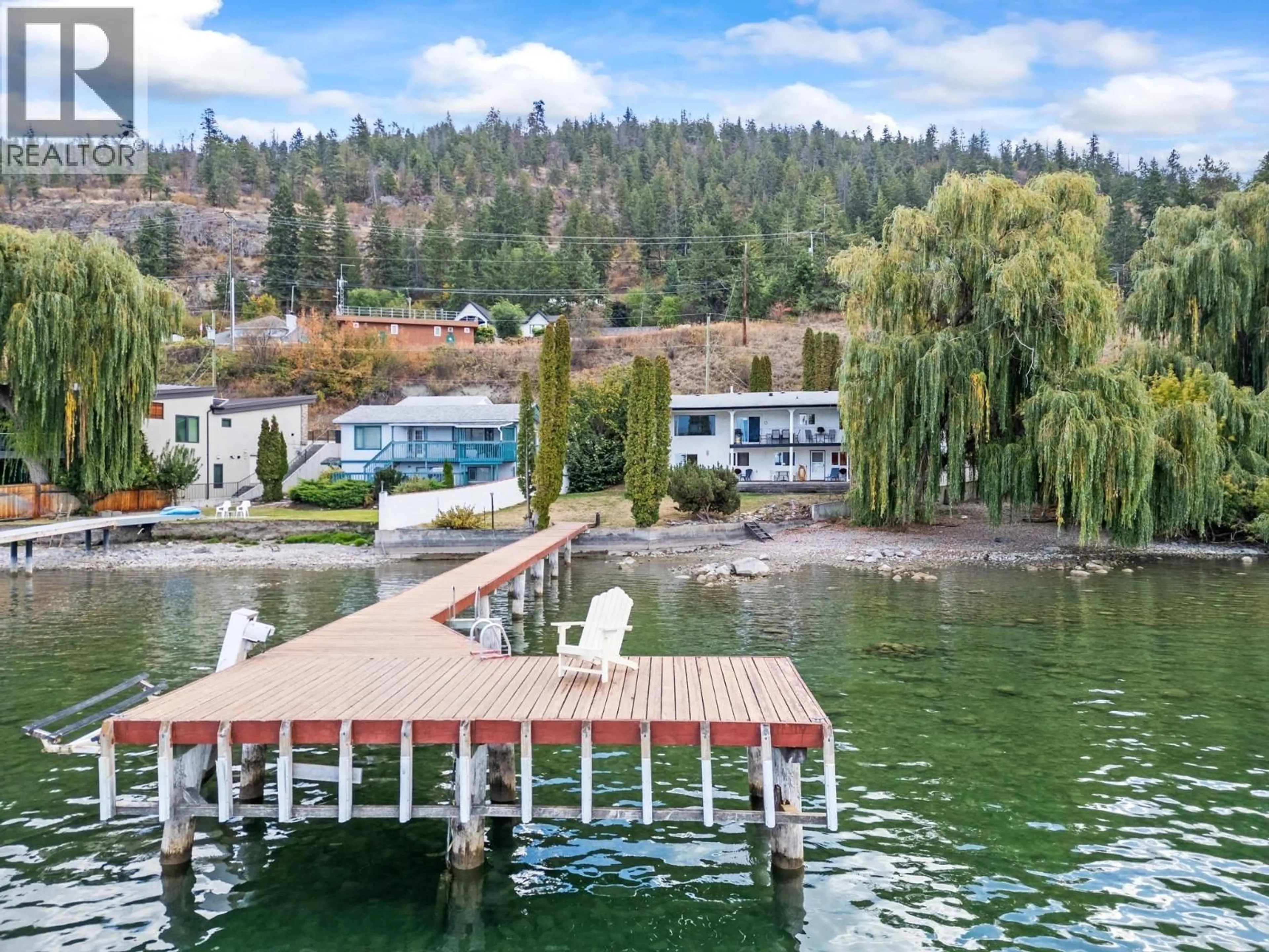 A pic from outside/outdoor area/front of a property/back of a property/a pic from drone, water/lake/river/ocean view for 8997 PETERS ROAD, Vernon British Columbia V1H1K1