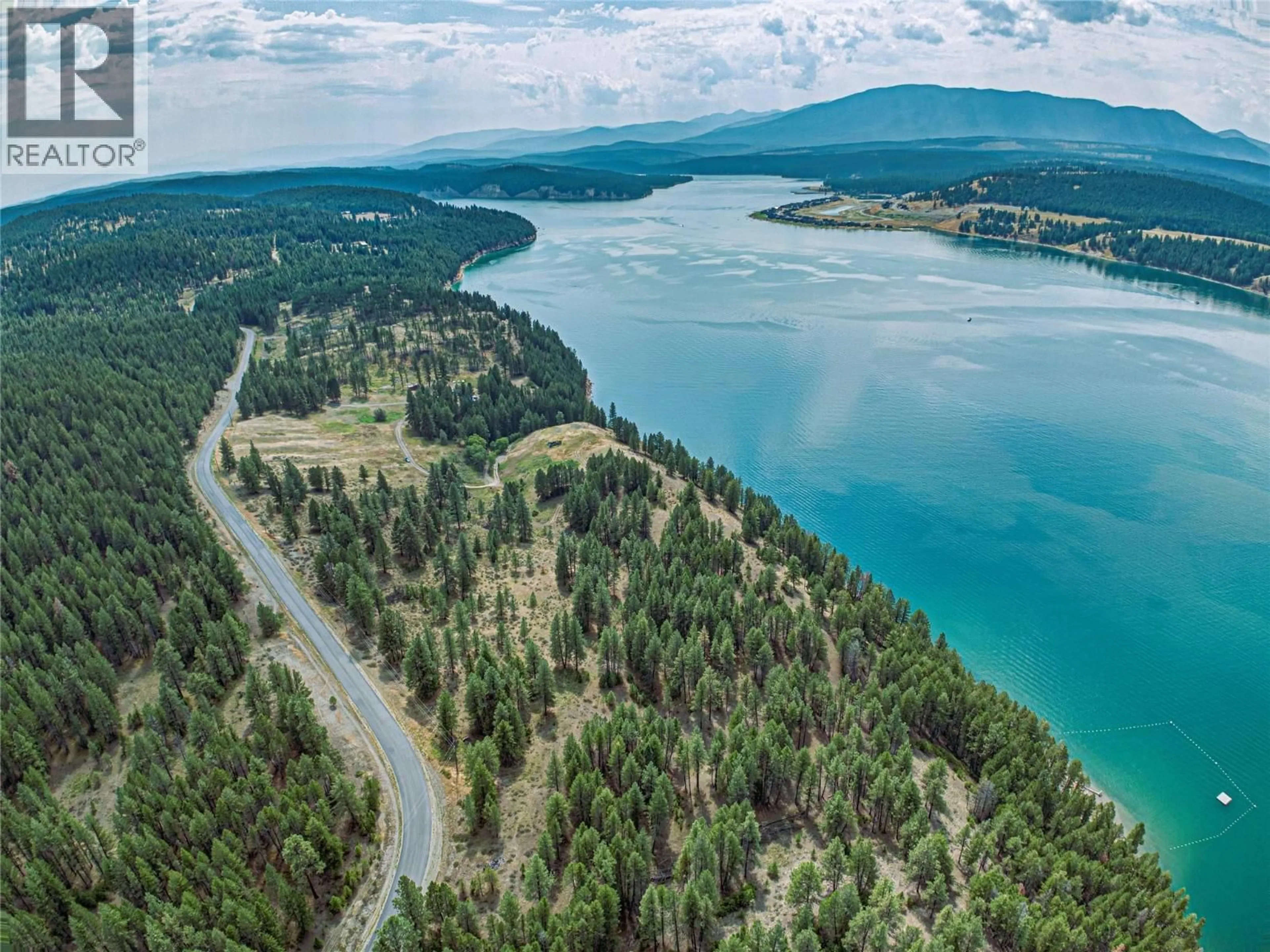 A pic from outside/outdoor area/front of a property/back of a property/a pic from drone, water/lake/river/ocean view for 1347 WALDO ROAD, Baynes Lake British Columbia V0B1T4