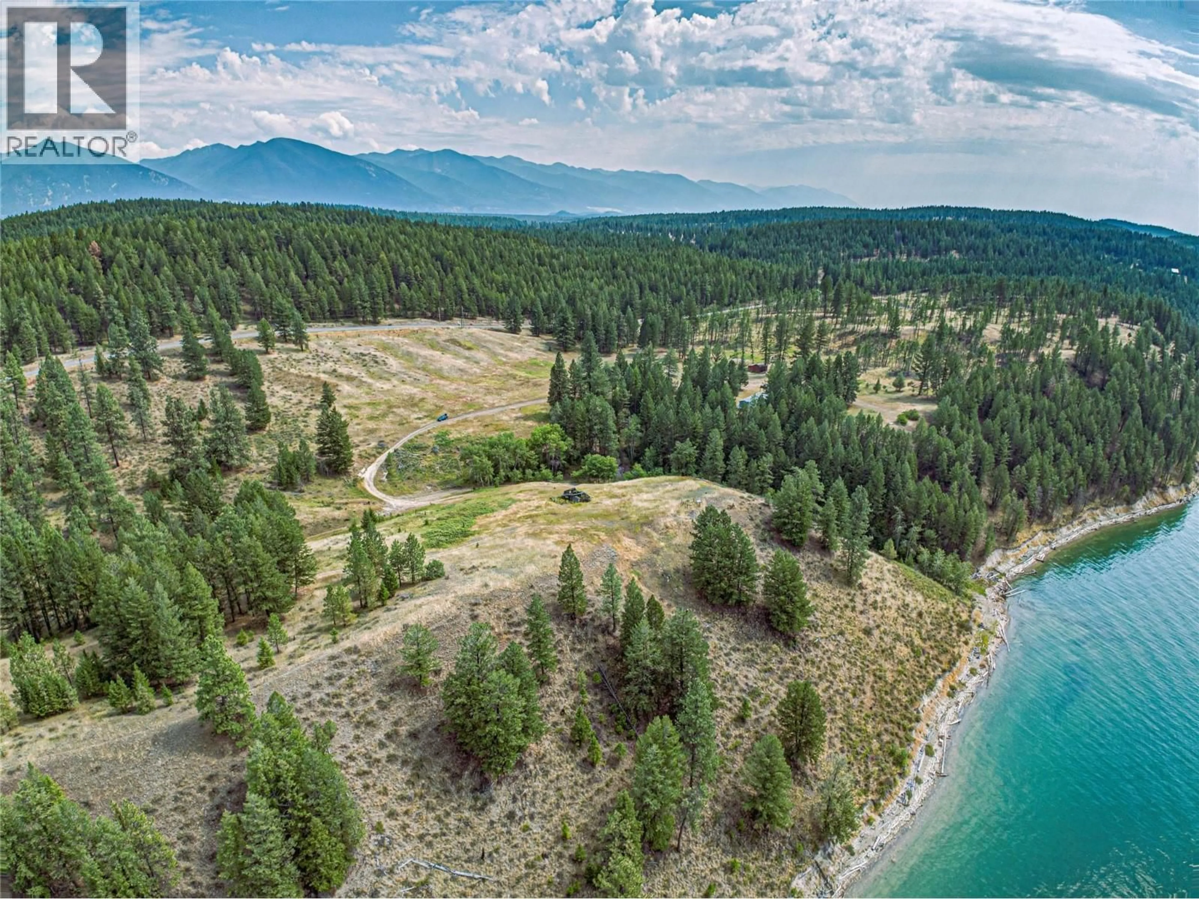 A pic from outside/outdoor area/front of a property/back of a property/a pic from drone, forest/trees view for 1347 WALDO ROAD, Baynes Lake British Columbia V0B1T4