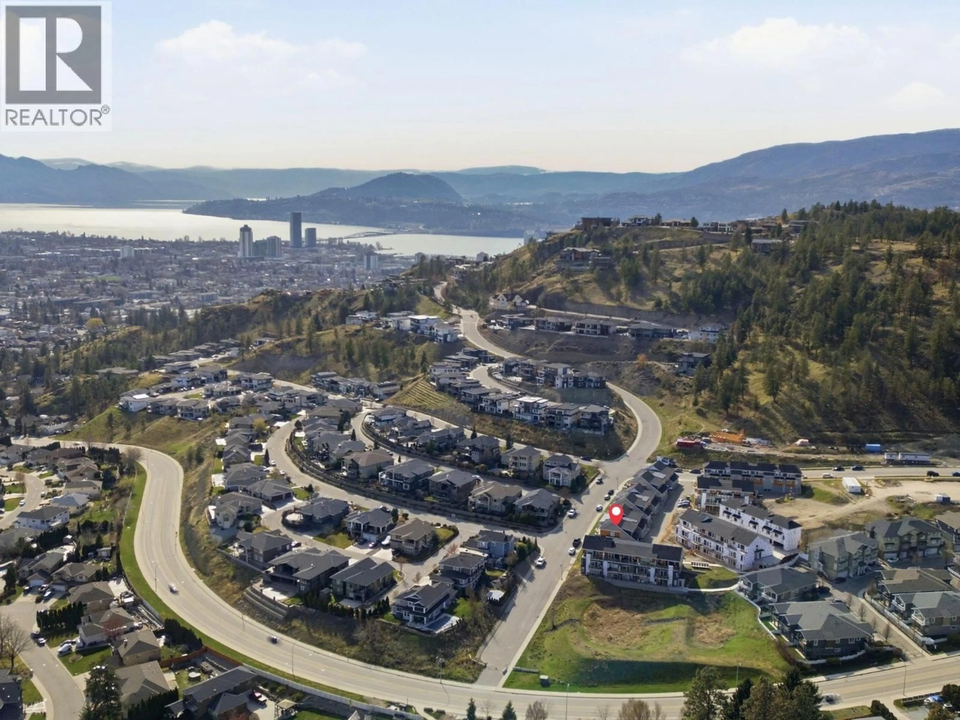 A pic from outside/outdoor area/front of a property/back of a property/a pic from drone, mountain view for 71 - 685 BOYNTON PLACE, Kelowna British Columbia V1V2Y2