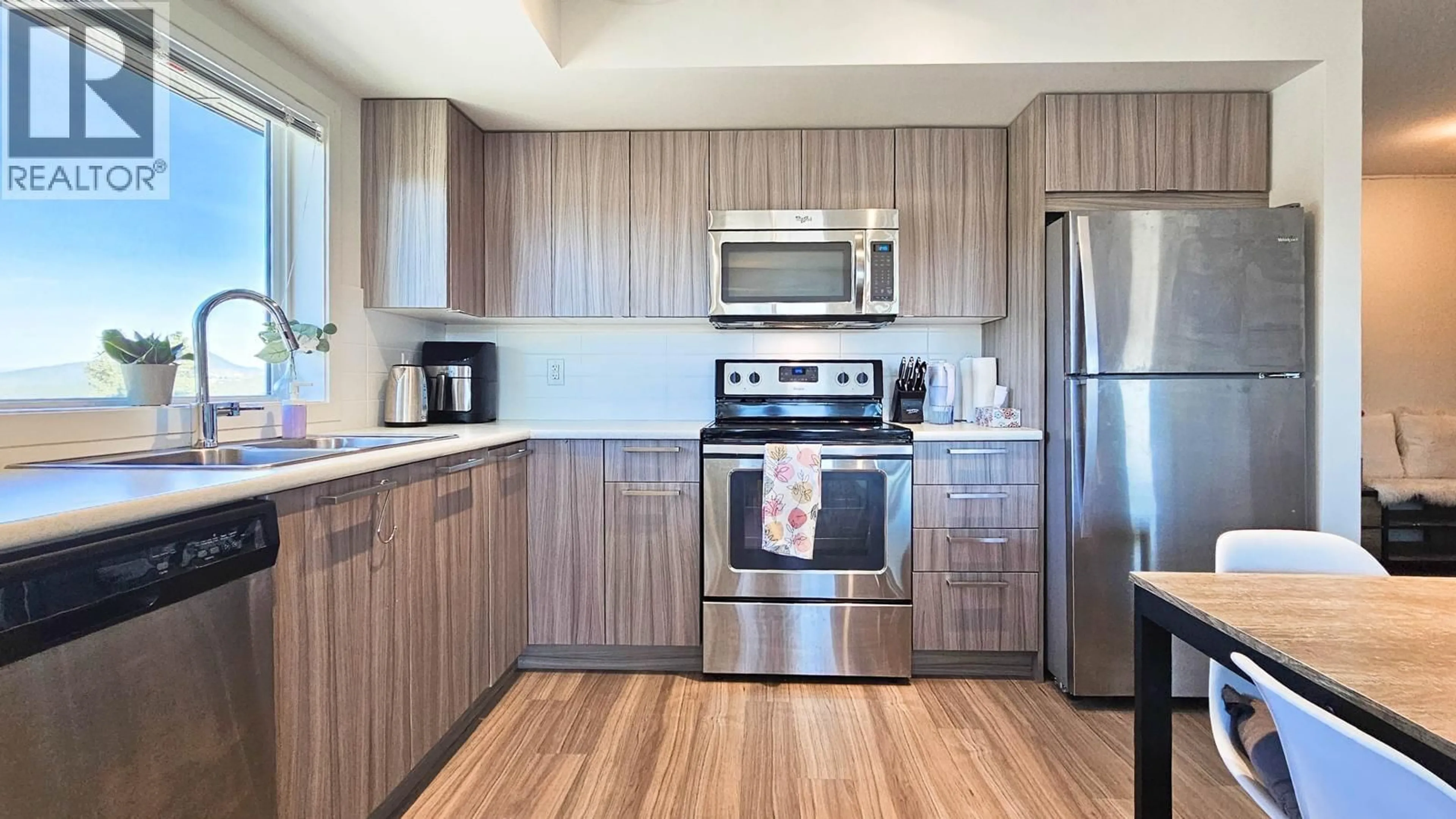 Standard kitchen, wood/laminate floor for PH12 - 883 ACADEMY WAY, Kelowna British Columbia V1V0A3