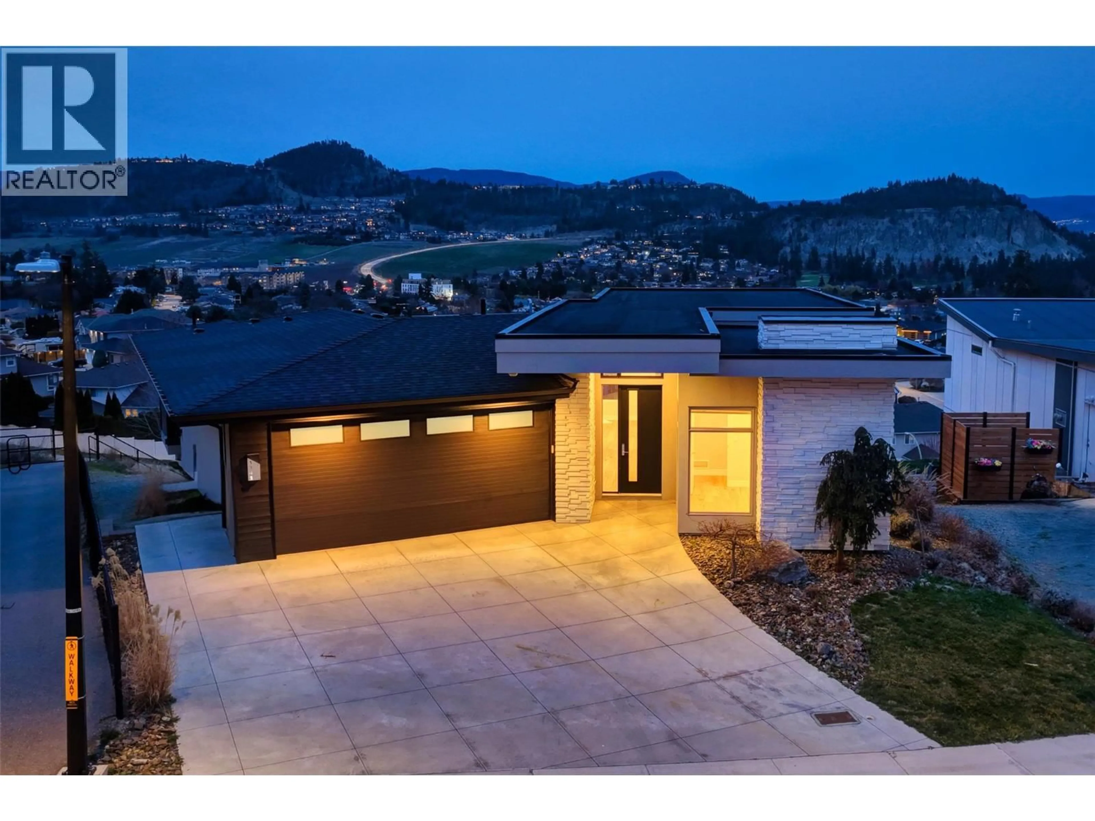 Home with brick exterior material, mountain view for 1341 SLADEN CRESCENT, Kelowna British Columbia V1V2Y1